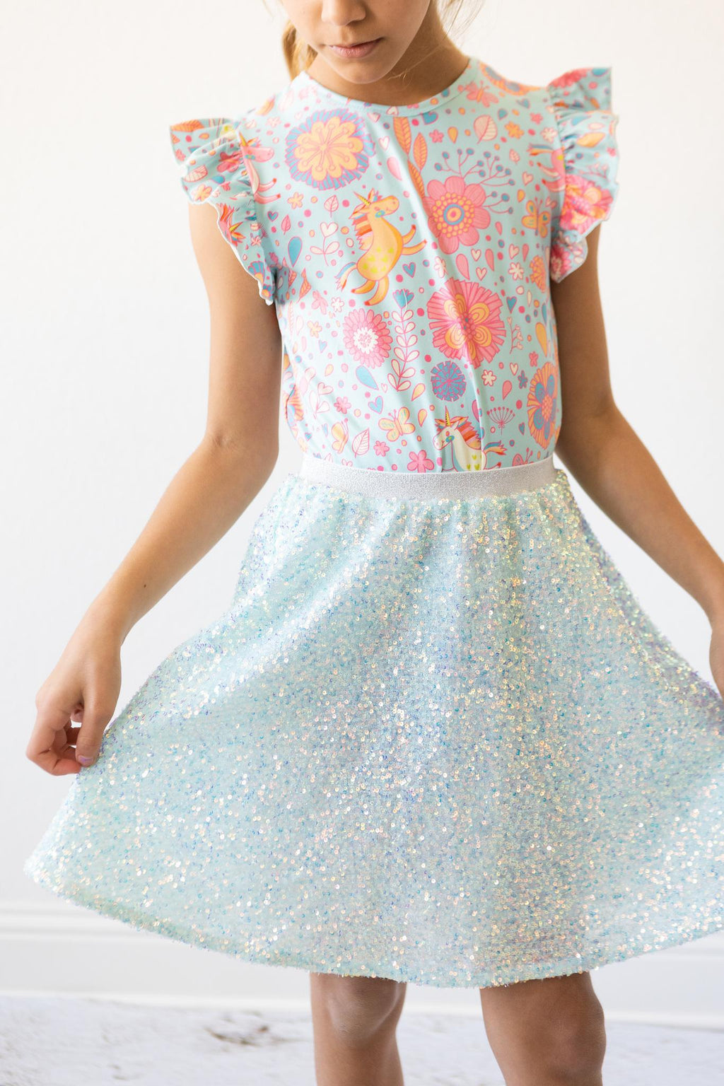 Mila & Rose ® SALE Blue Retro Unicorns S/S Ruffle Tee — in-use photo