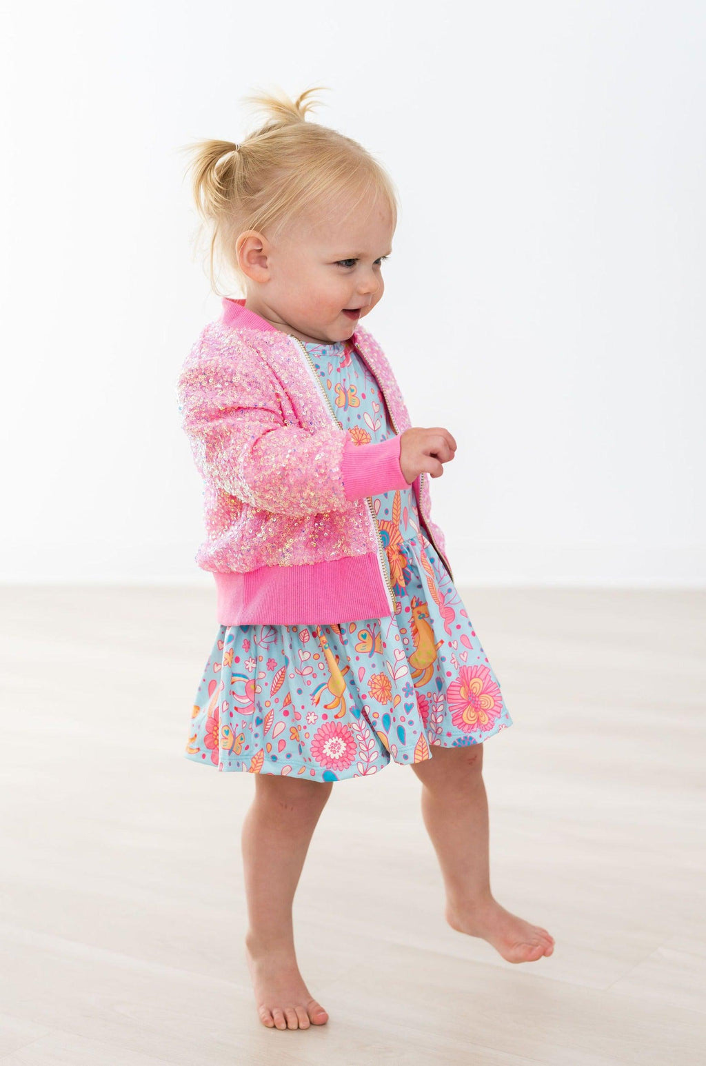 Mila & Rose ® SALE Blue Retro Unicorns S/S Twirl Bodysuit — lifestyle context