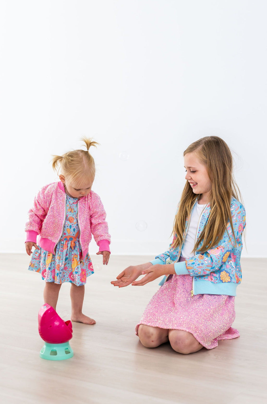 Mila & Rose ® SALE Blue Retro Unicorns Satin Jacket — lifestyle context