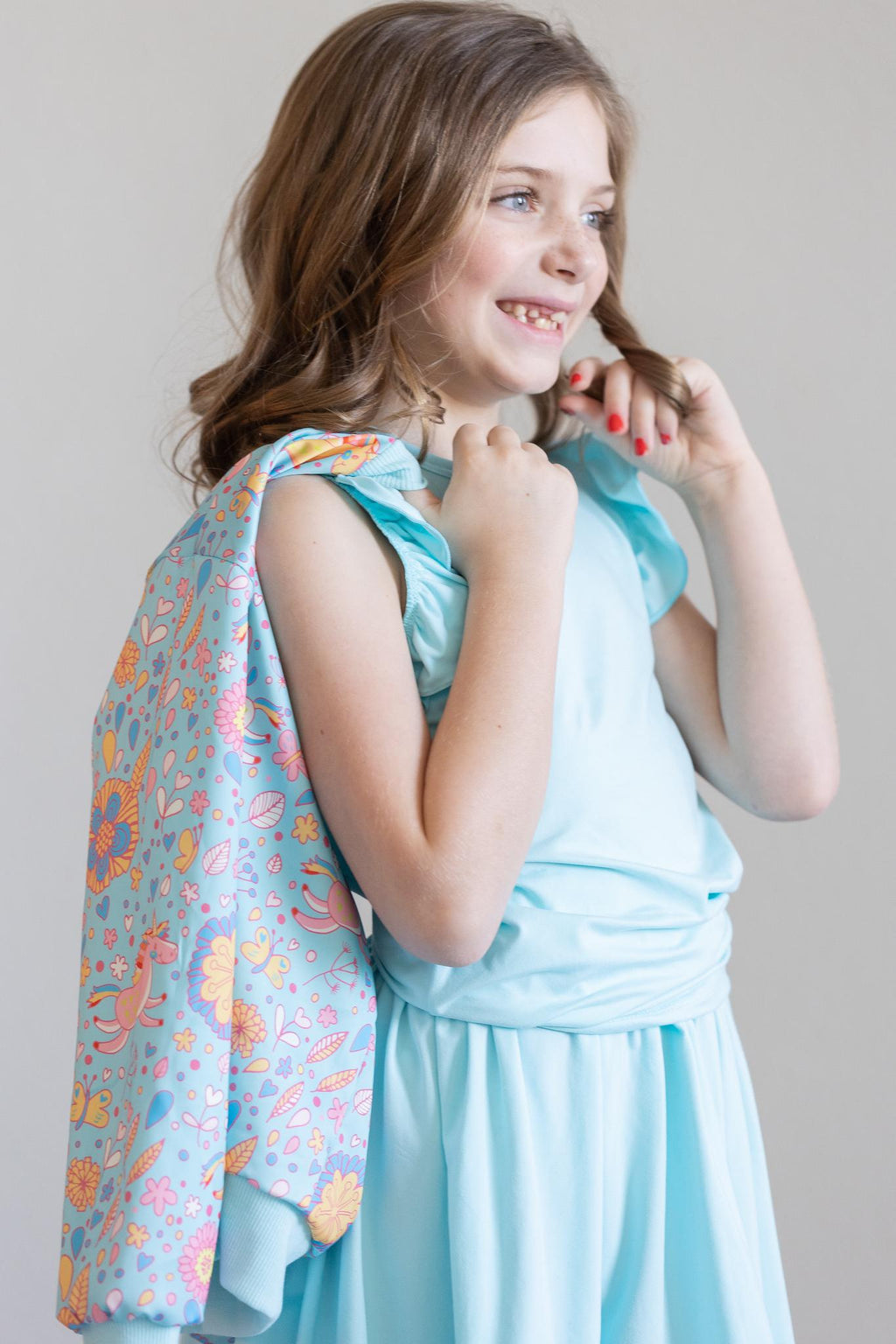 Mila & Rose ® SALE Blue Retro Unicorns Satin Jacket — in-use photo