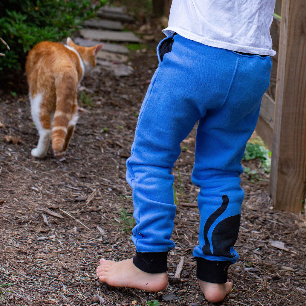 Princess Awesome & Boy Wonder Cat and Yarn Fuzzy Fleece Joggers with Pockets — pants category context
