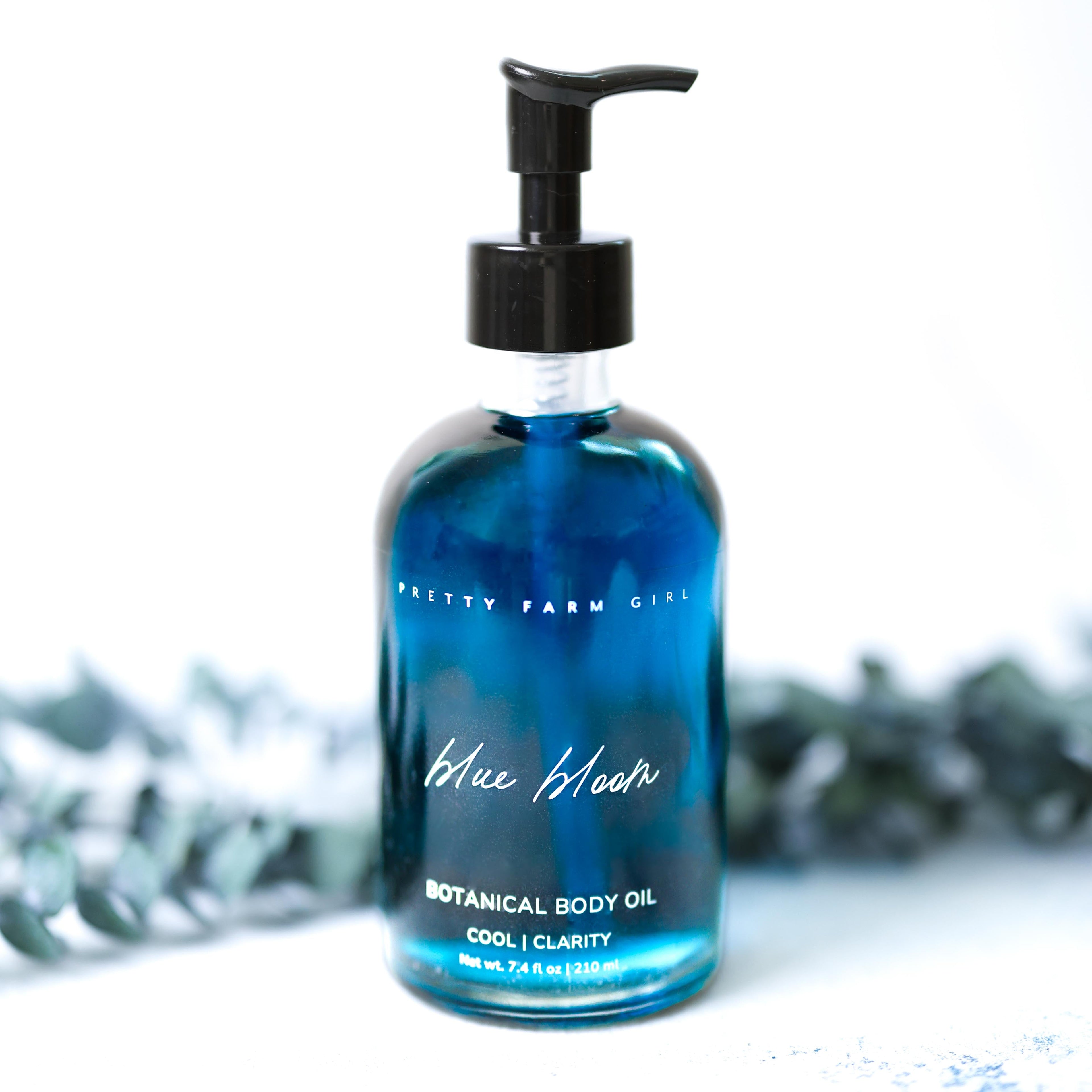 Pretty farm girl Blue Bloom Natural Botanical Body Oil — lifestyle context