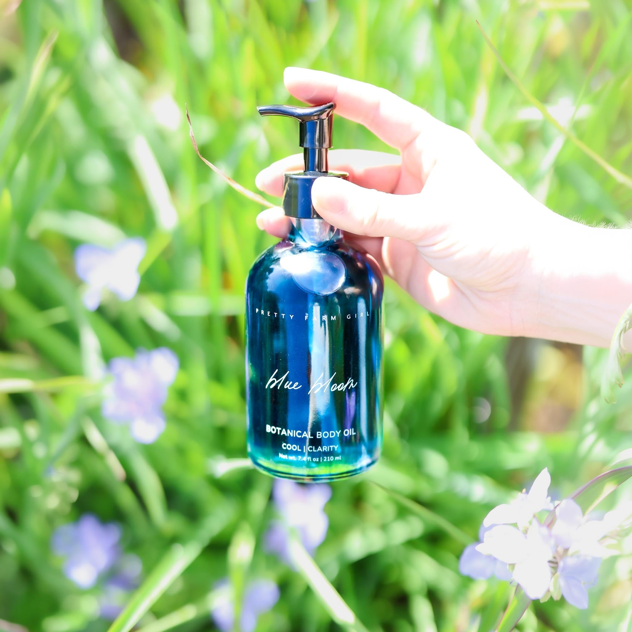 Pretty farm girl Blue Bloom Natural Botanical Body Oil — main product shot