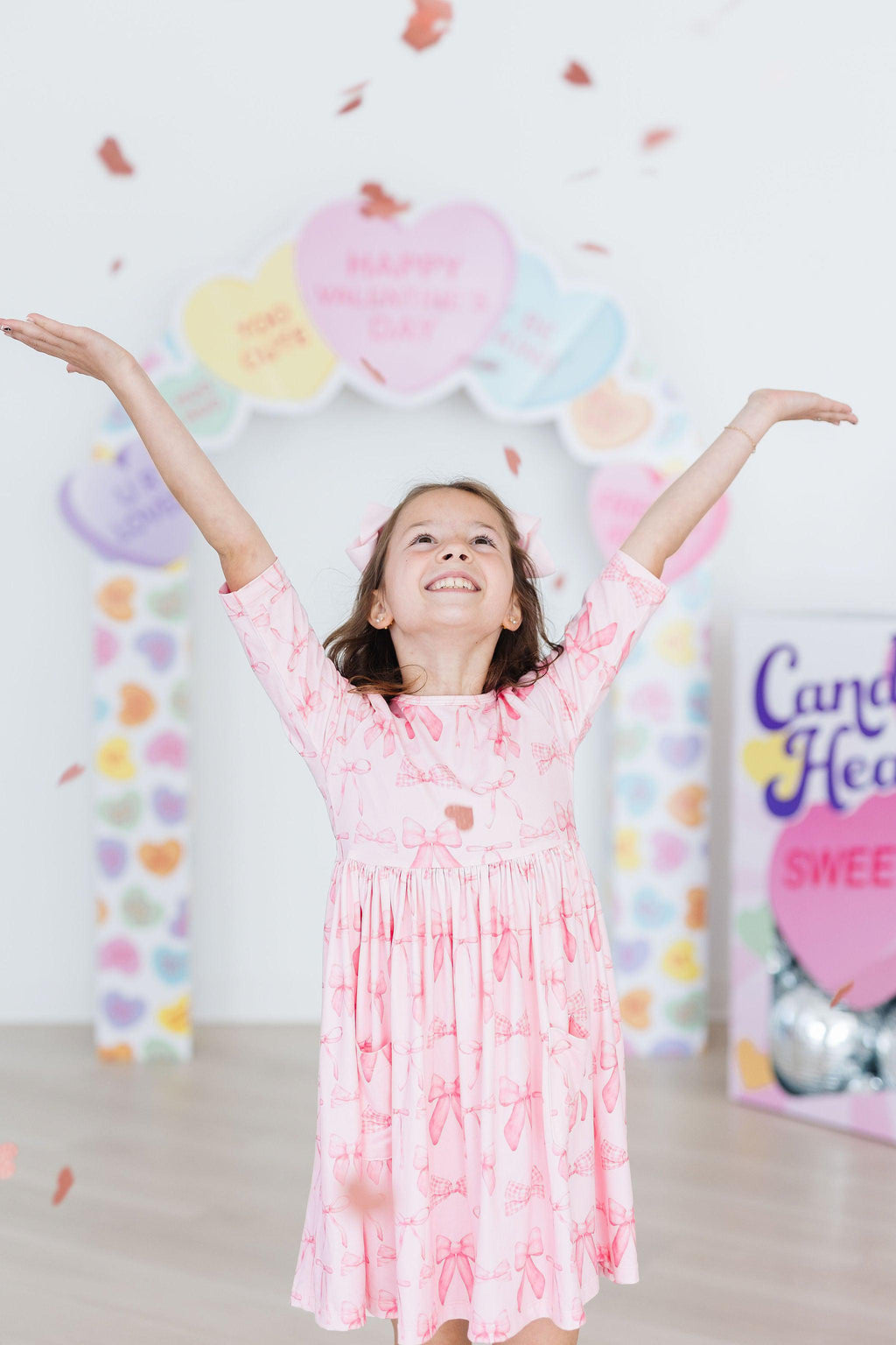 Mila & Rose ® Blushing Bows 3/4 Sleeve Pocket Twirl Dress — back view