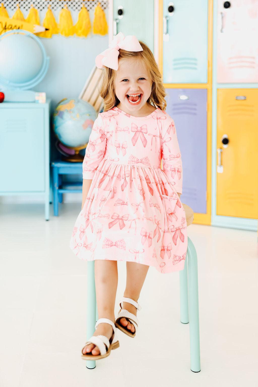 Mila & Rose ® Blushing Bows 3/4 Sleeve Pocket Twirl Dress — comparison shot