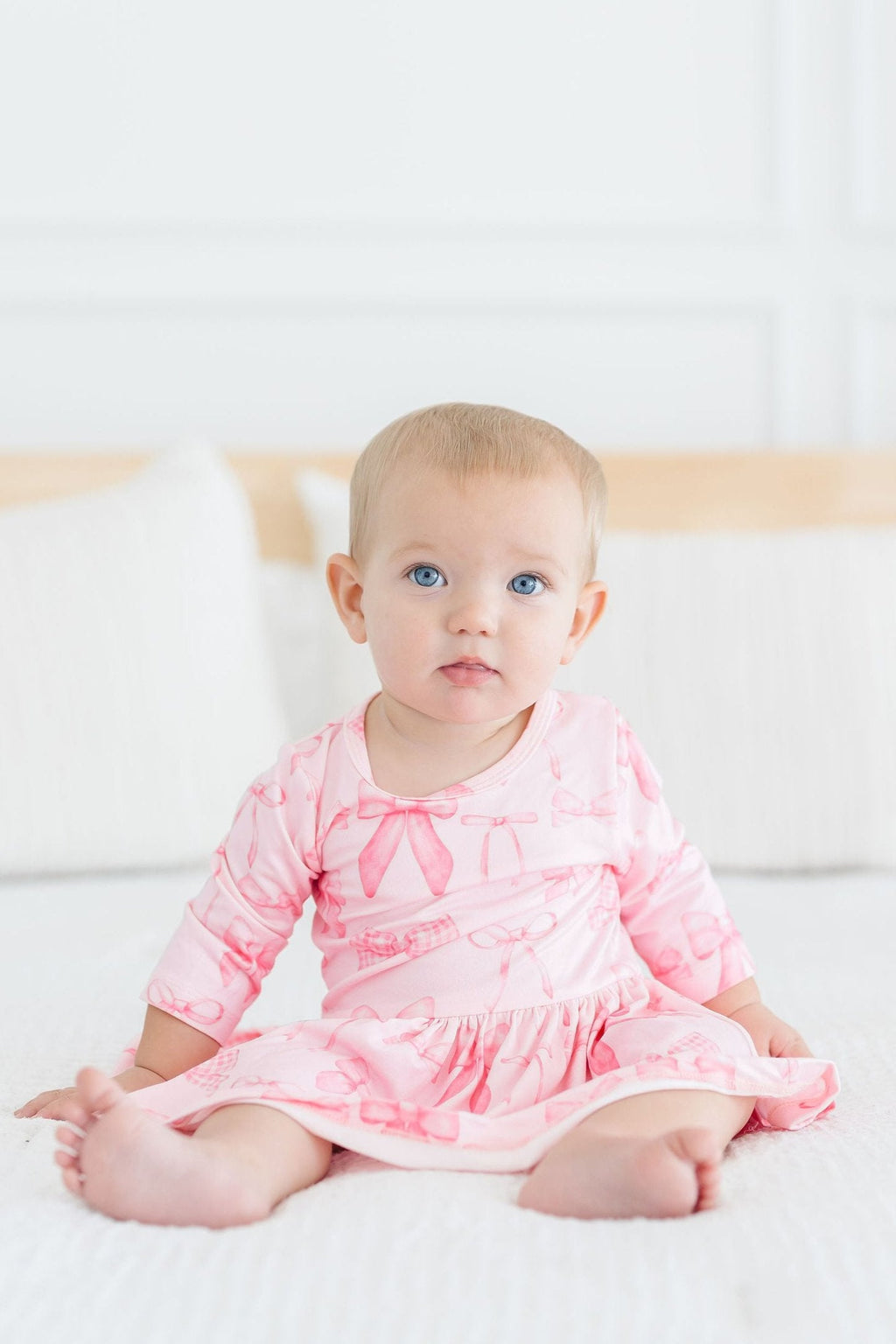 Mila & Rose ® Blushing Bows 3/4 Sleeve Twirl Bodysuit — lifestyle context