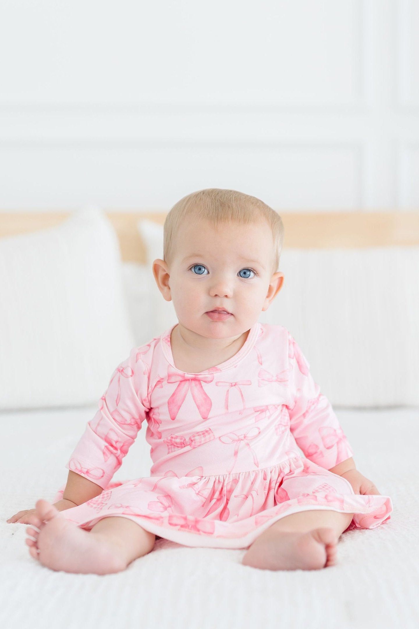 Mila & Rose ® Blushing Bows 3/4 Sleeve Twirl Bodysuit — lifestyle context