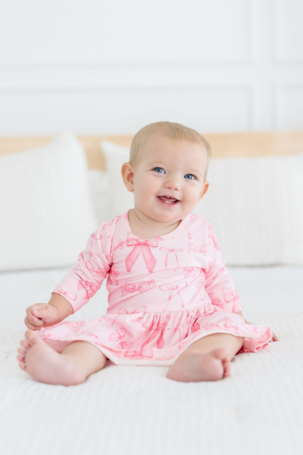 Mila & Rose ® Blushing Bows 3/4 Sleeve Twirl Bodysuit — back view
