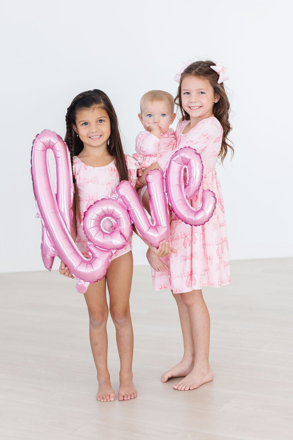 Mila & Rose ® Blushing Bows S/S Flutter Sleeve Leotard — side view