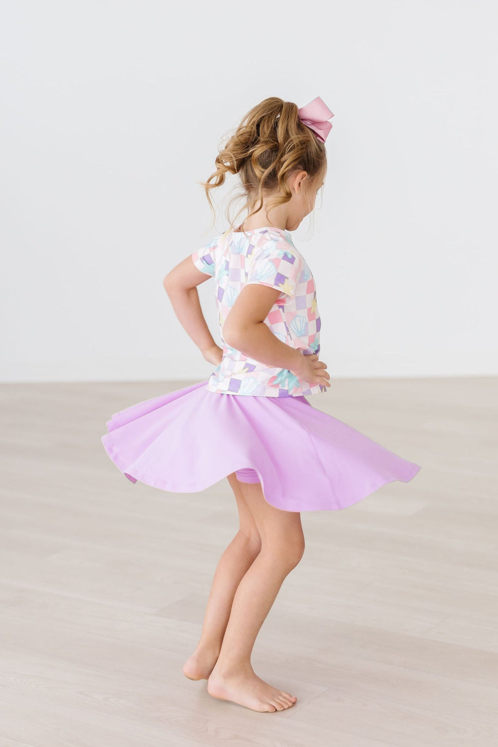 Mila & Rose ® Bright Lilac Twirl Skort — lifestyle context