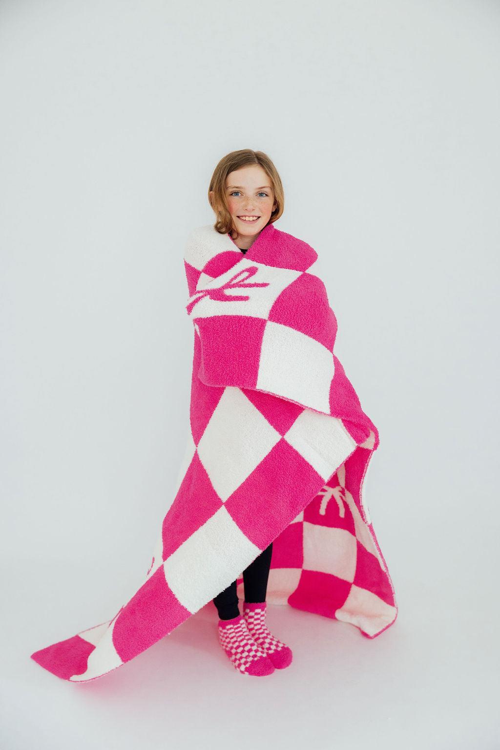 Mila & Rose ® Bright Pink Checker Bow Cozy Blanket — detail close-up
