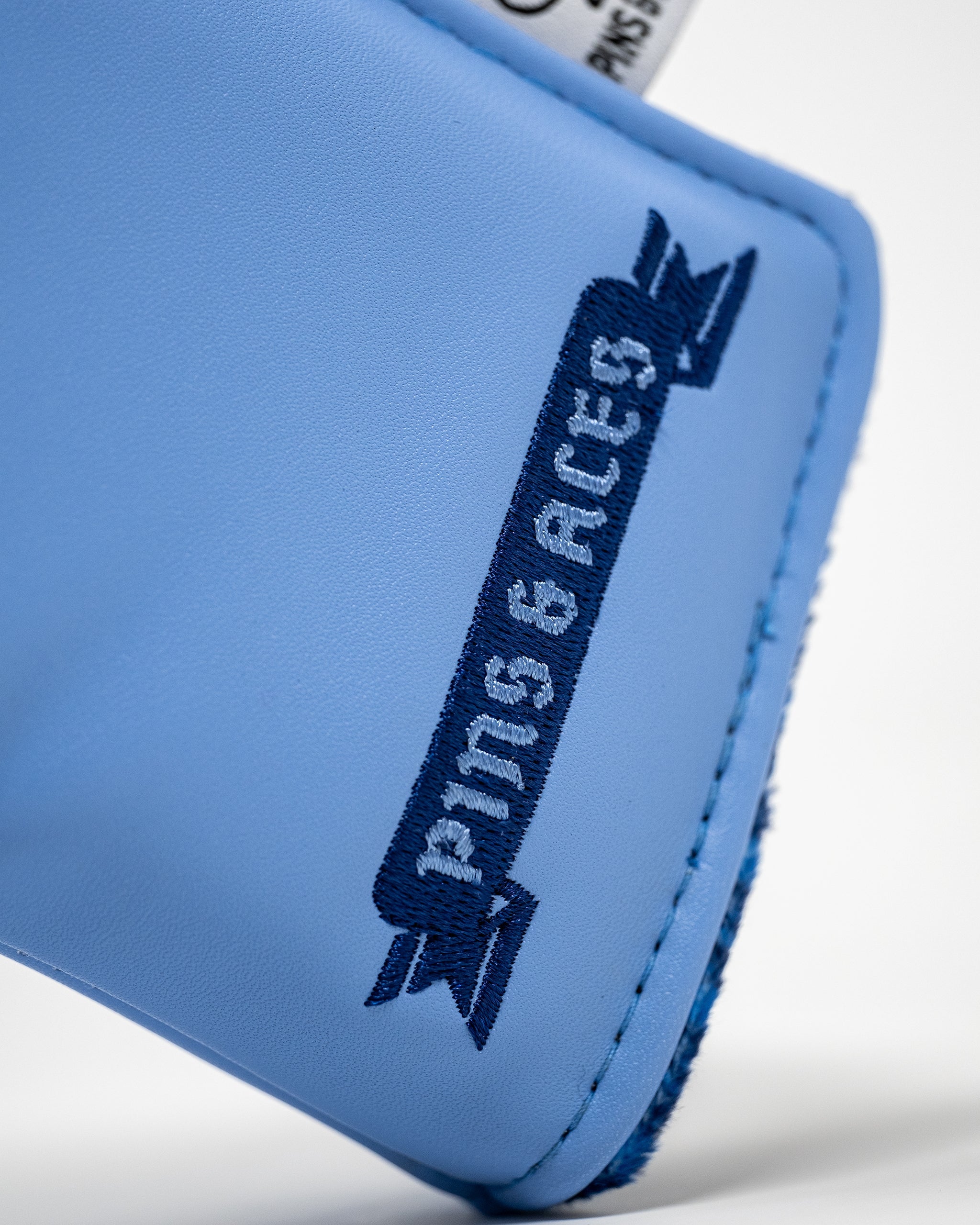 Pins and Aces Coat of Arms - Blade Putter Cover — lifestyle context
