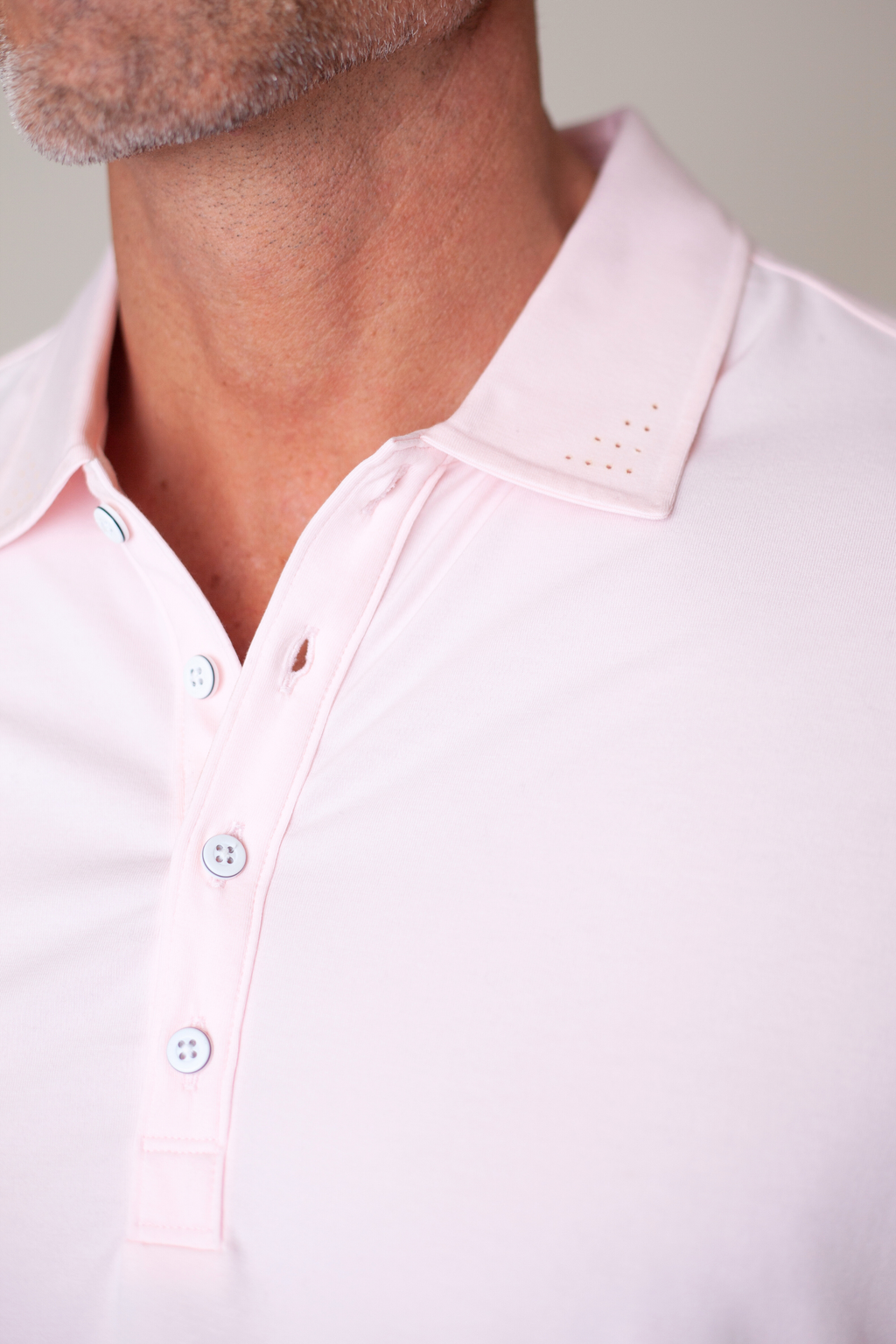 Buki Coolest Polo Tech Shirt - Sunrise — detail close-up