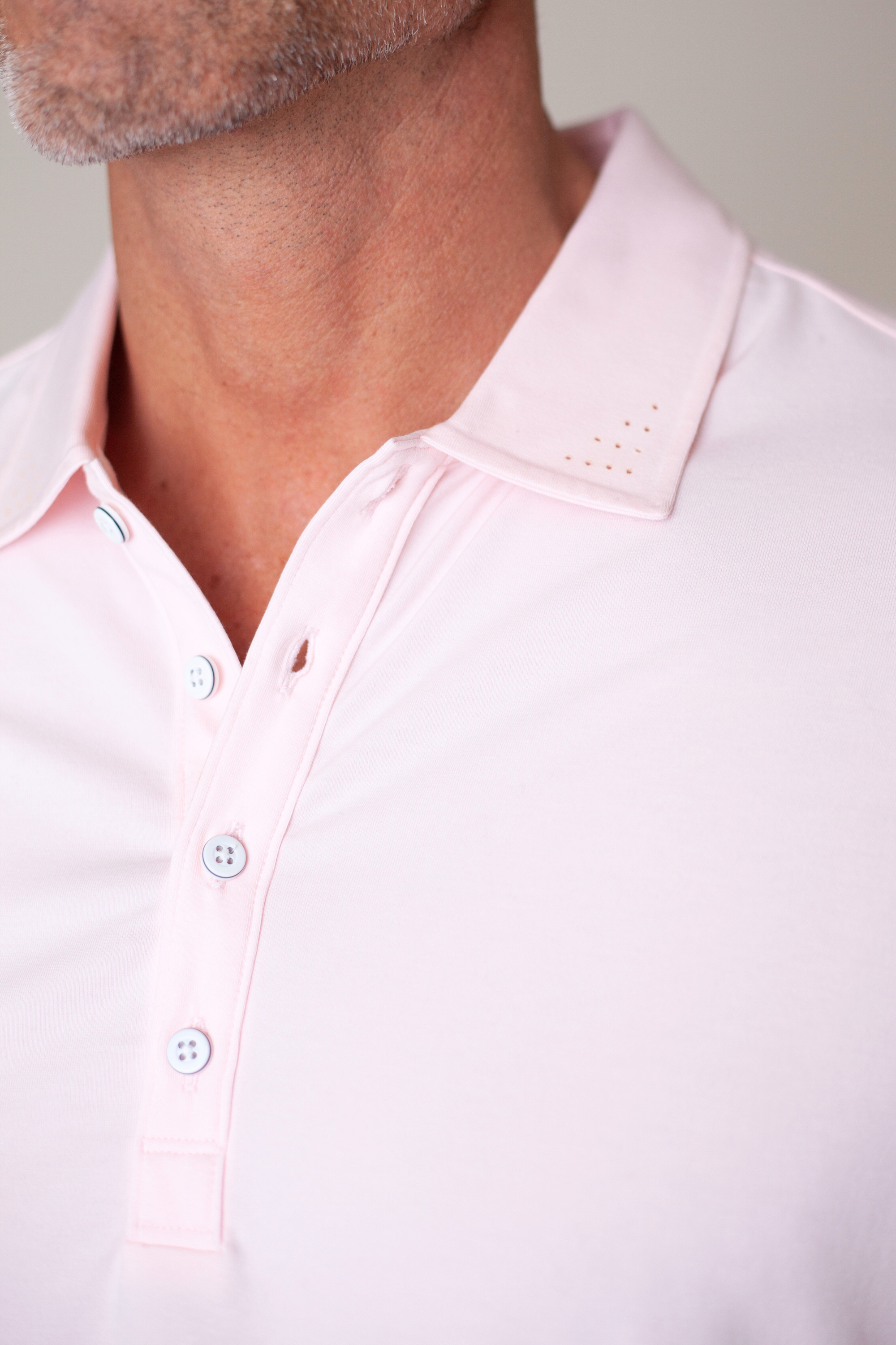 Buki Coolest Polo Tech Shirt - Sunrise — detail close-up
