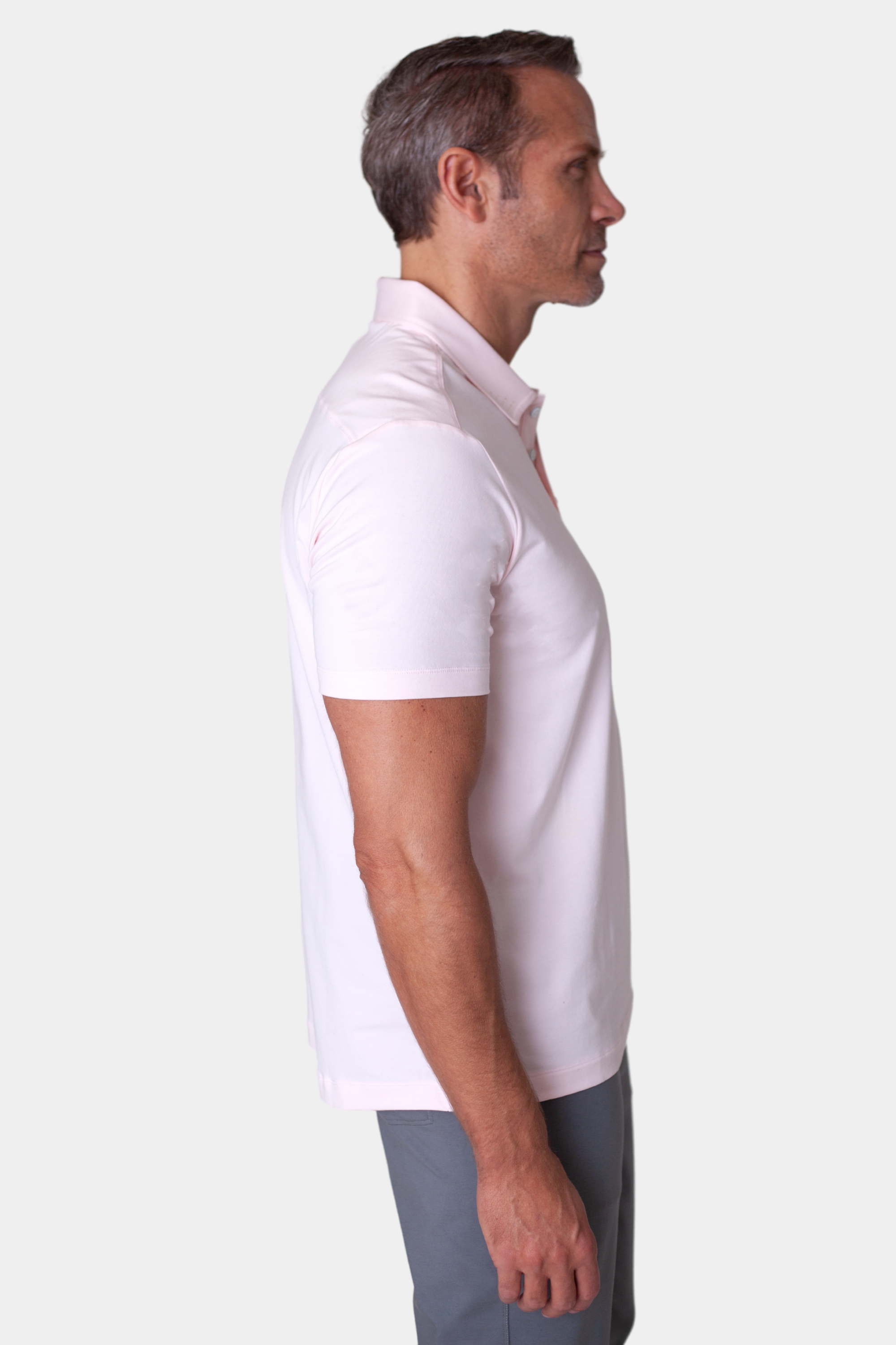 Buki Coolest Polo Tech Shirt - Sunrise — lifestyle context