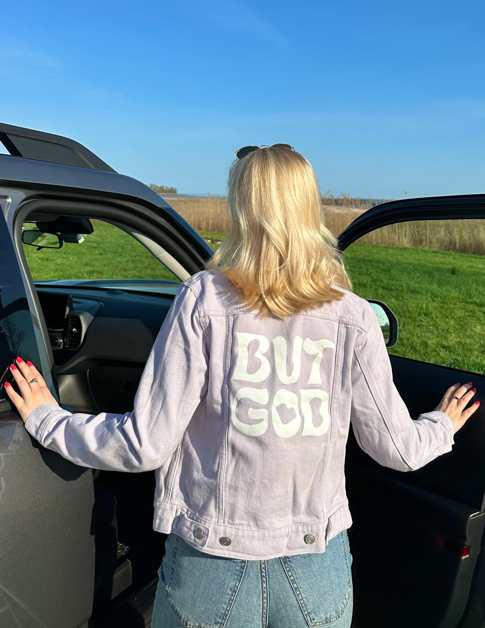 Elevated Faith But God Cropped Denim Jacket — lifestyle context