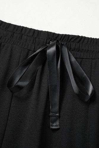 Pretty Little Patriot Pretty Little Patriot Wide Leg Black Lace Pants — lifestyle worn / used context