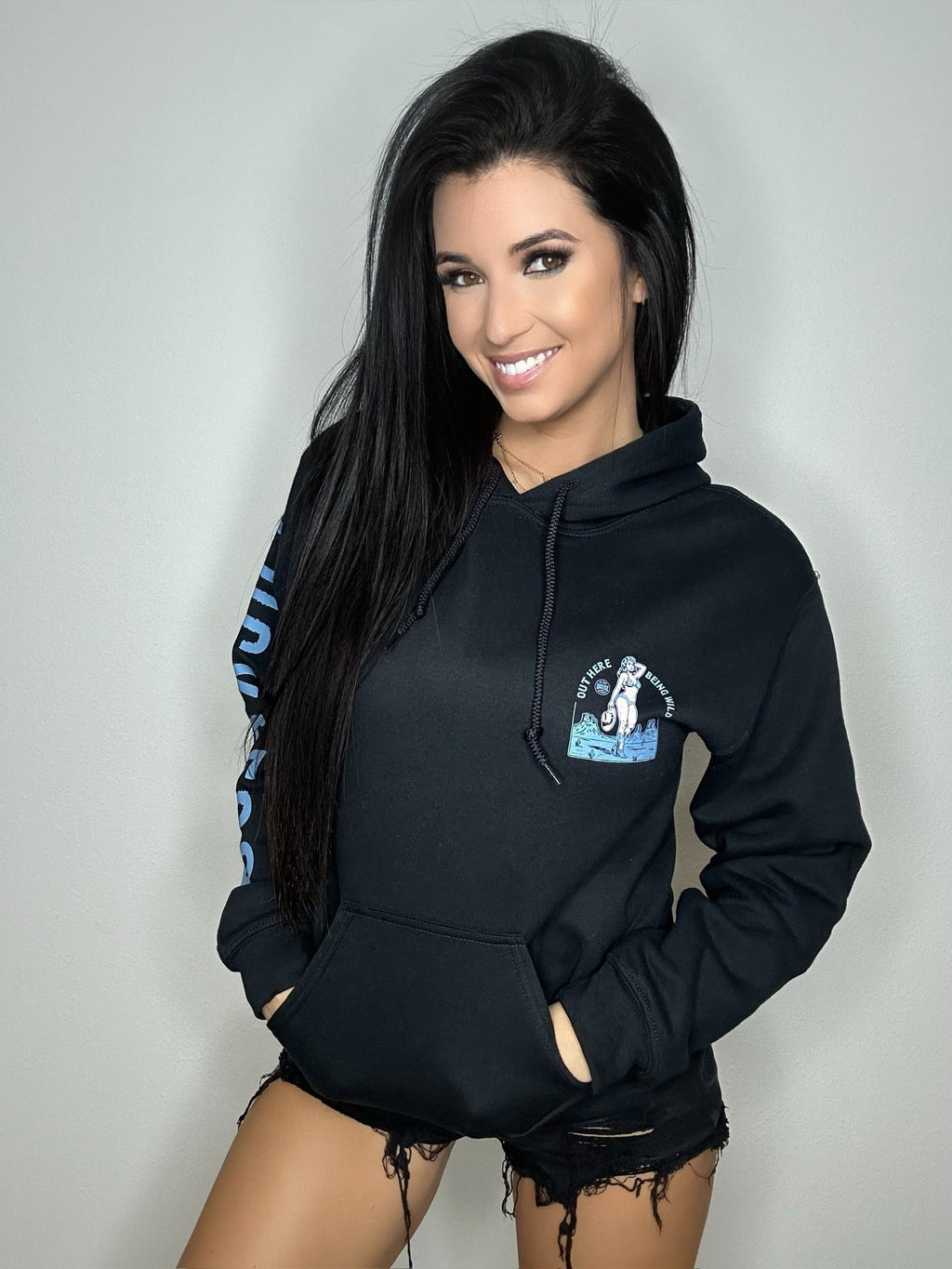 Luckless Outfitters Out Here Being Wild Hoodie in Dew Blue — lifestyle context