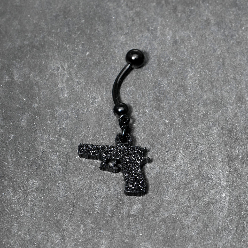 BodyCandy Jet Black Glitter Gun Dangle Belly Ring — lifestyle context