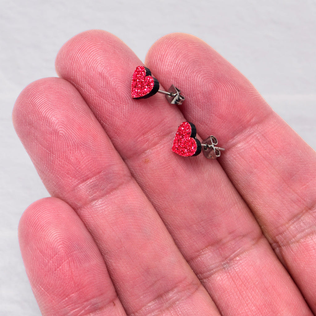 BodyCandy Ruby Red Glitter Heart Stud Earrings — side view