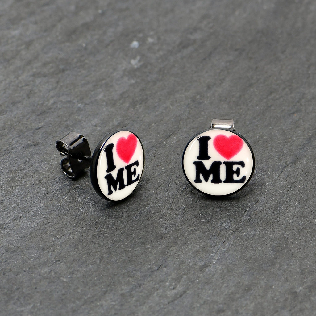 BodyCandy Black Anodized Steel Glow in the Dark Stud Earrings by Onyx O — in-use photo