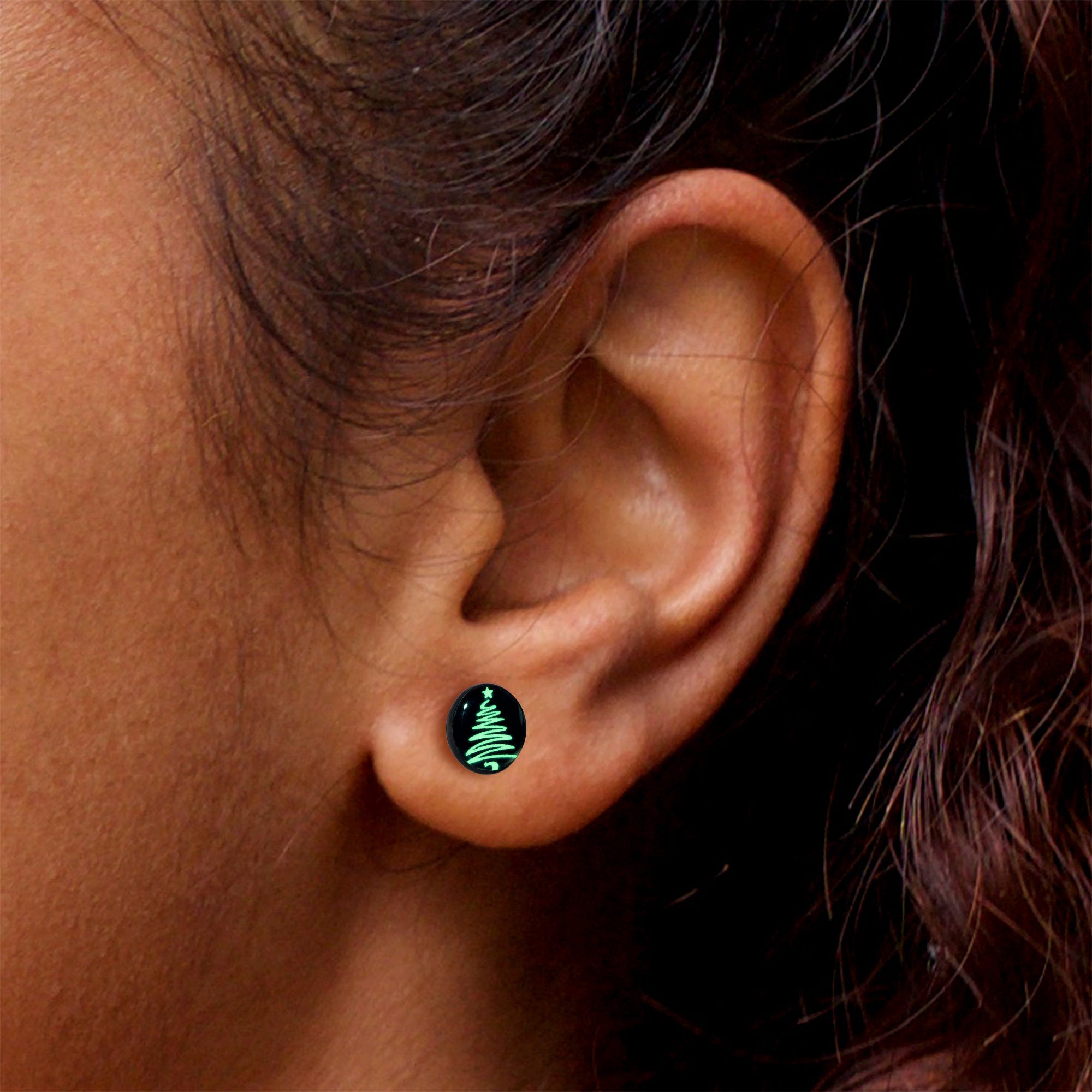 BodyCandy Black Anodized Glow in the Dark Holiday Christmas Tree Stud Earrings by Onyx O — in-use photo
