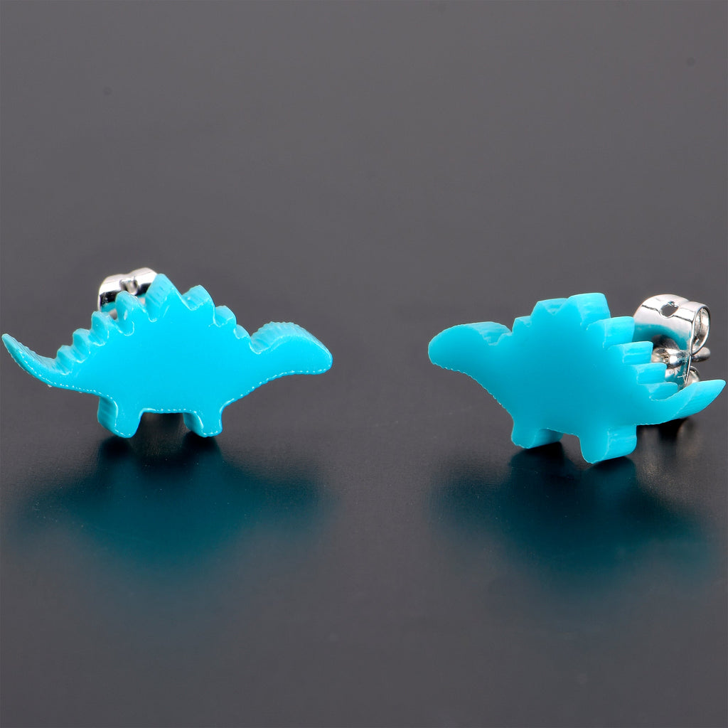 BodyCandy Blue Acrylic Stegosaurus Dinosaur Stud Earrings — in-use photo
