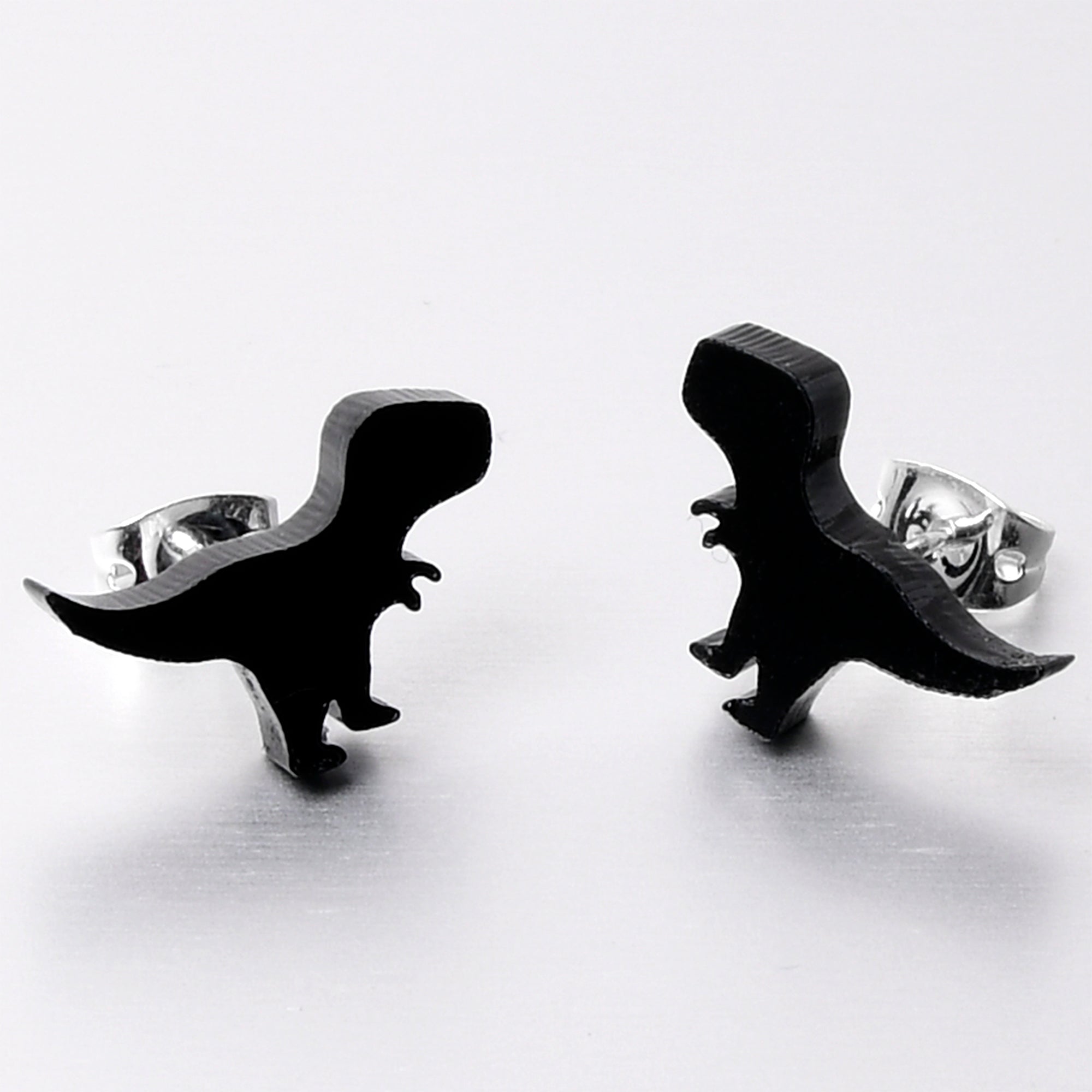 BodyCandy Black Acrylic Tyrannosaurus Rex Dinosaur Stud Earrings — lifestyle context