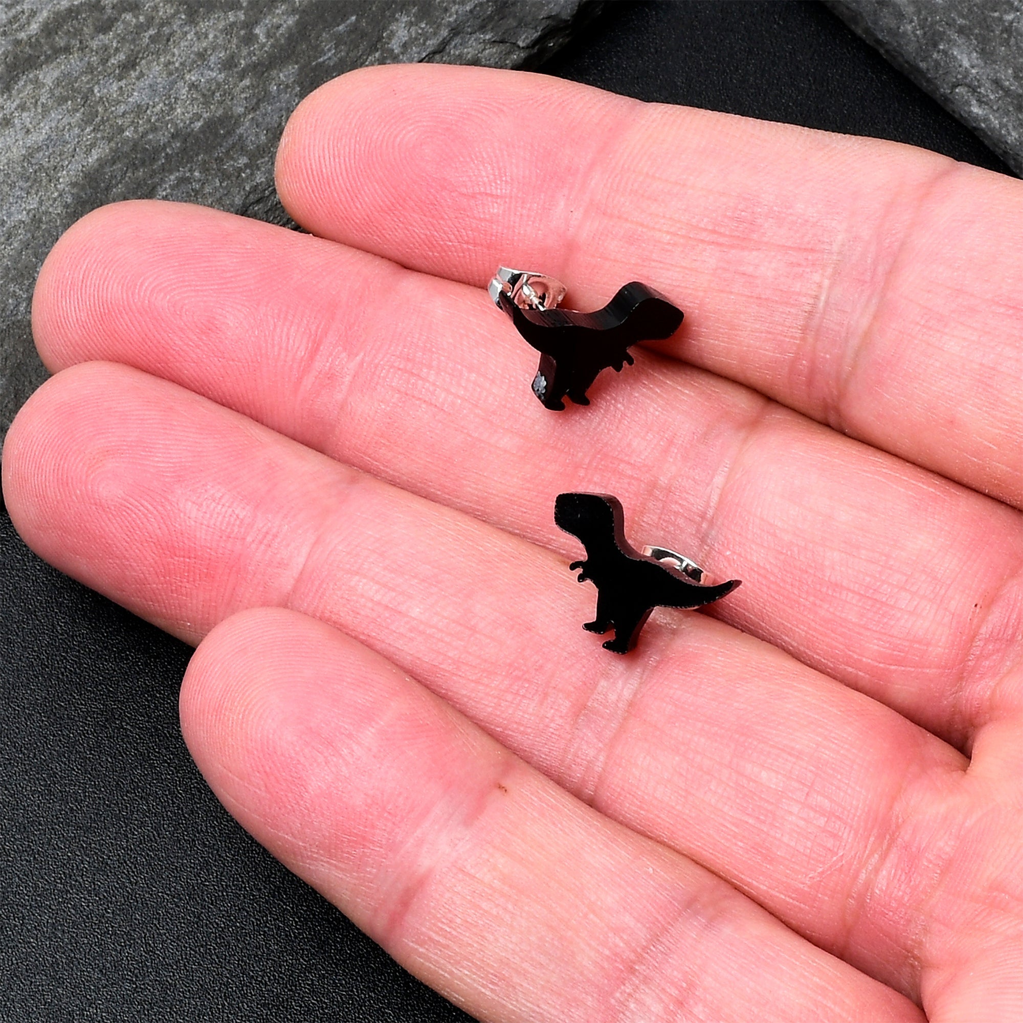 BodyCandy Black Acrylic Tyrannosaurus Rex Dinosaur Stud Earrings — side view