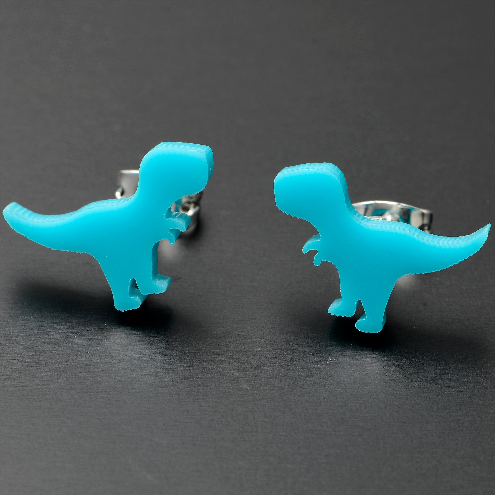 BodyCandy Blue Acrylic Tyrannosaurus Rex Dinosaur Stud Earrings — size reference