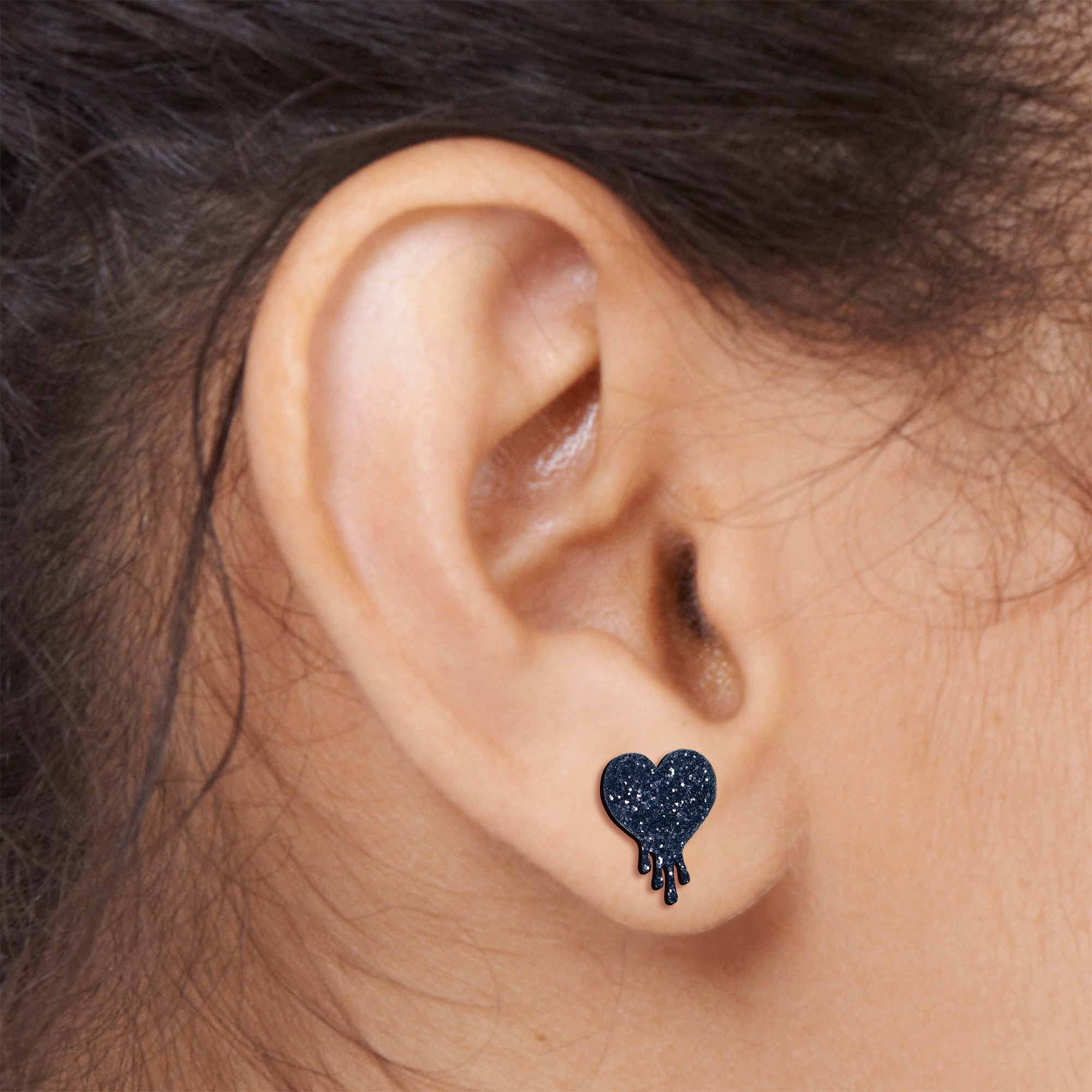 BodyCandy Glitter Melting Heart Stud Earrings — in-use photo