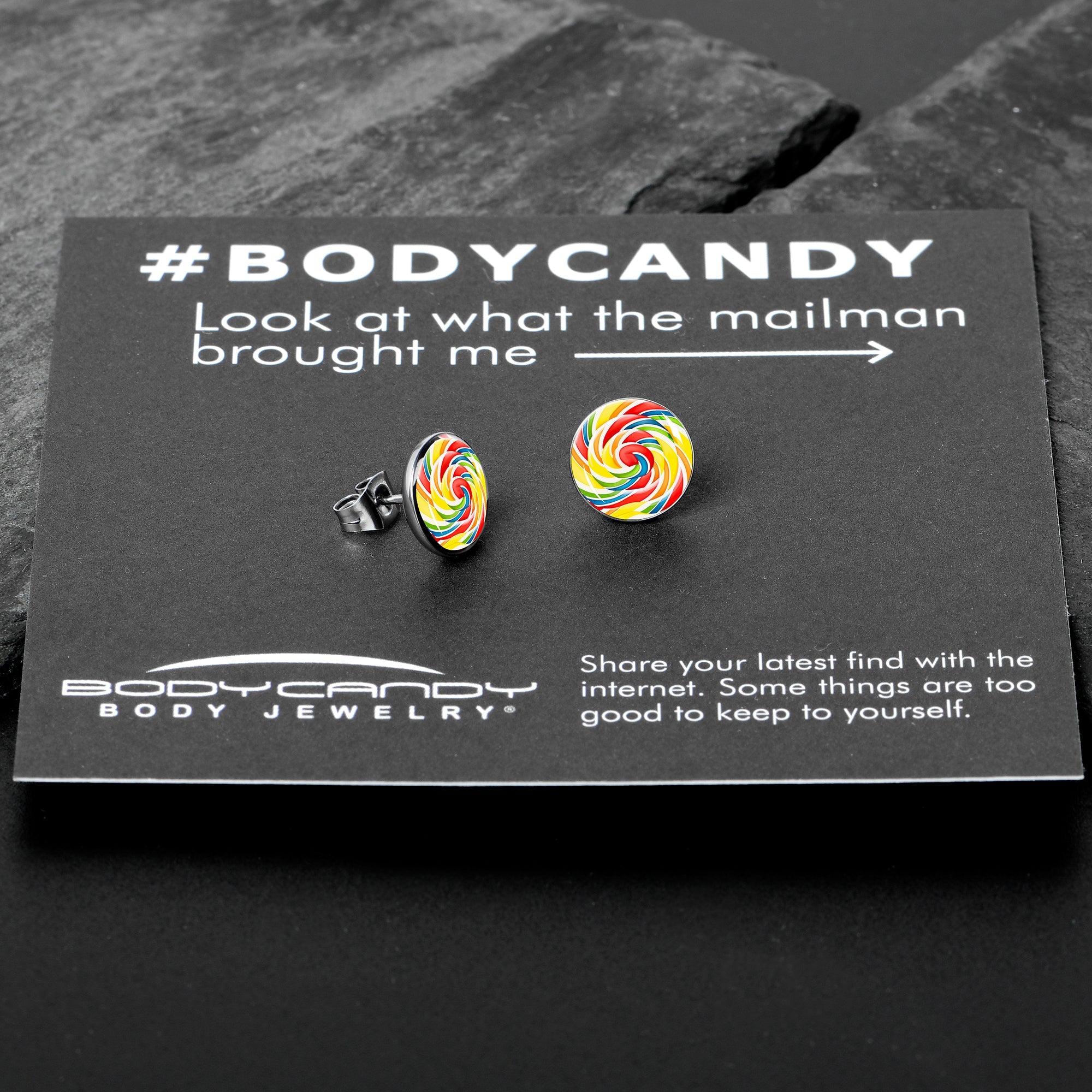 BodyCandy Rainbow Swirl Lollipop Stud Earrings by Onyx O — in-use photo