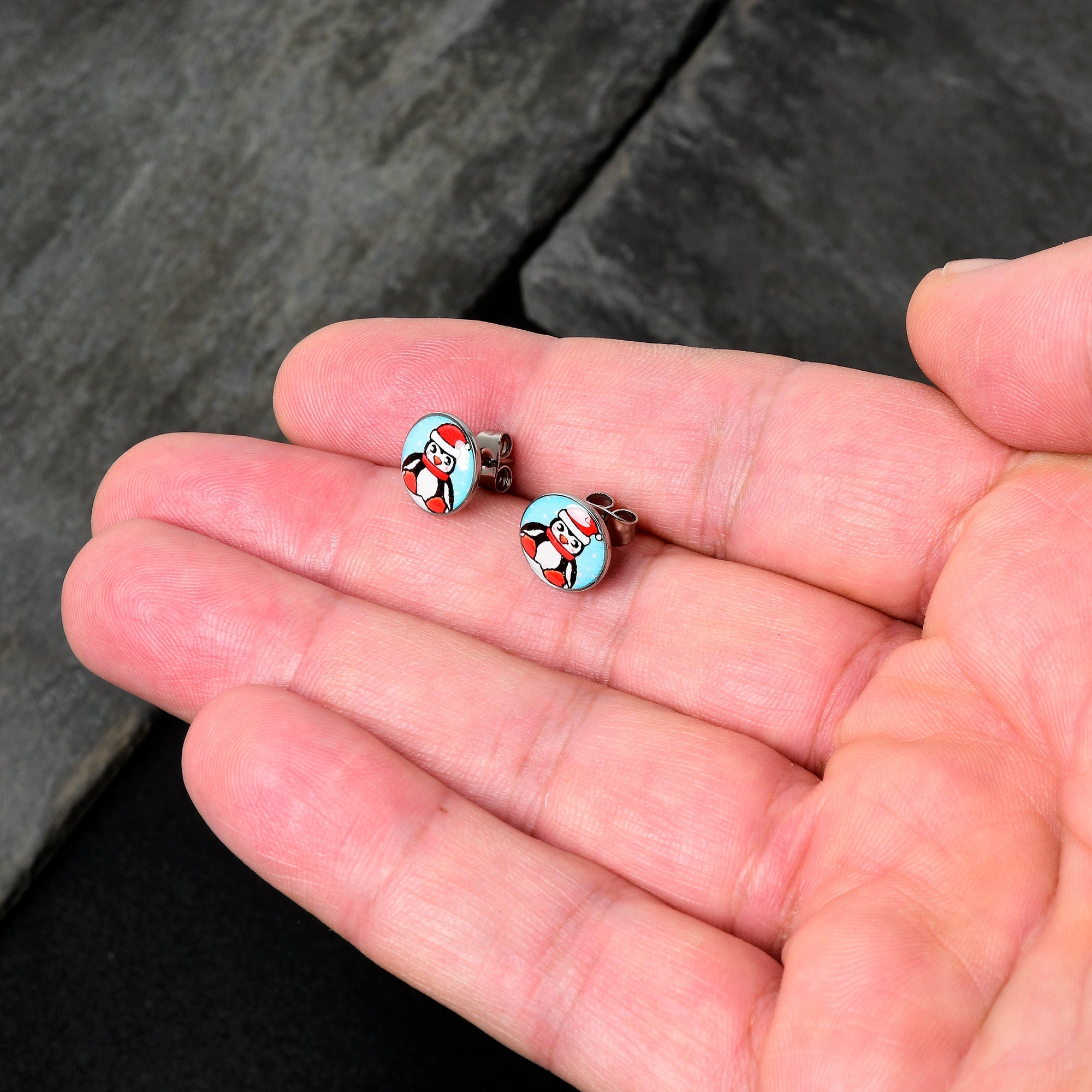 BodyCandy Snowfall Holiday Penguin Stud Earrings by Onyx O — detail close-up