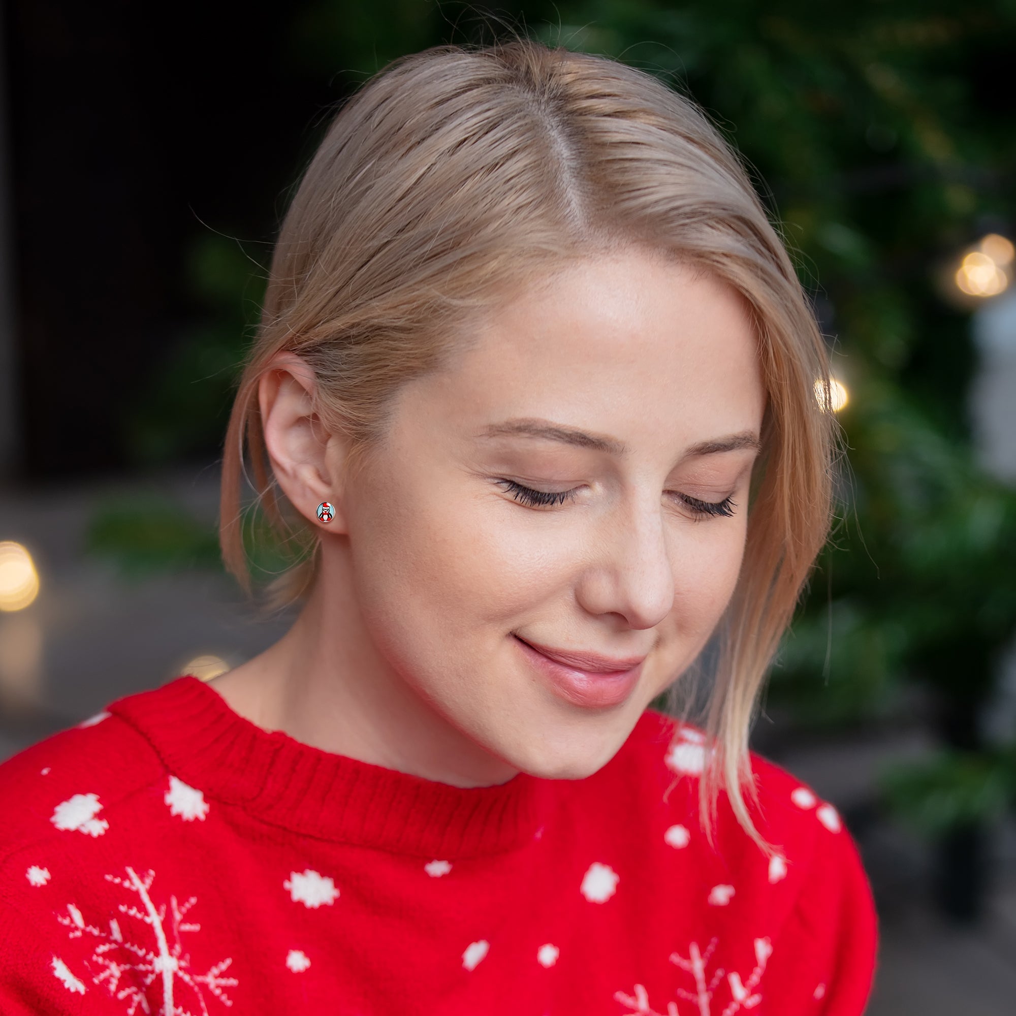 BodyCandy Snowfall Holiday Penguin Stud Earrings by Onyx O — side view