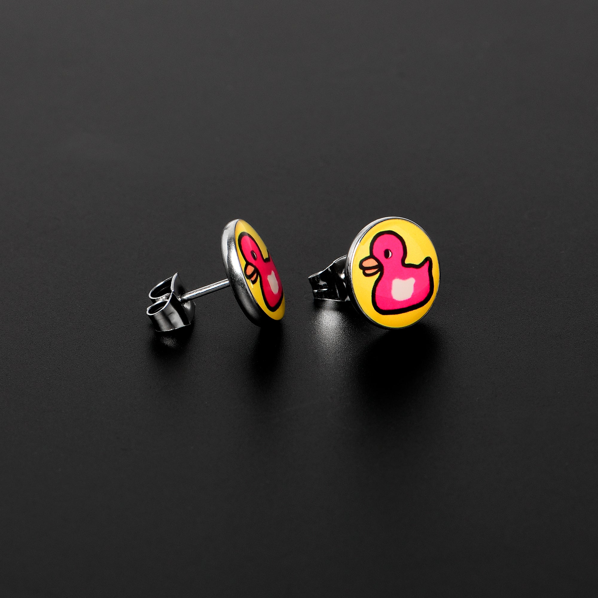 BodyCandy Pink Ducky Stud Earrings by Onyx O — lifestyle context