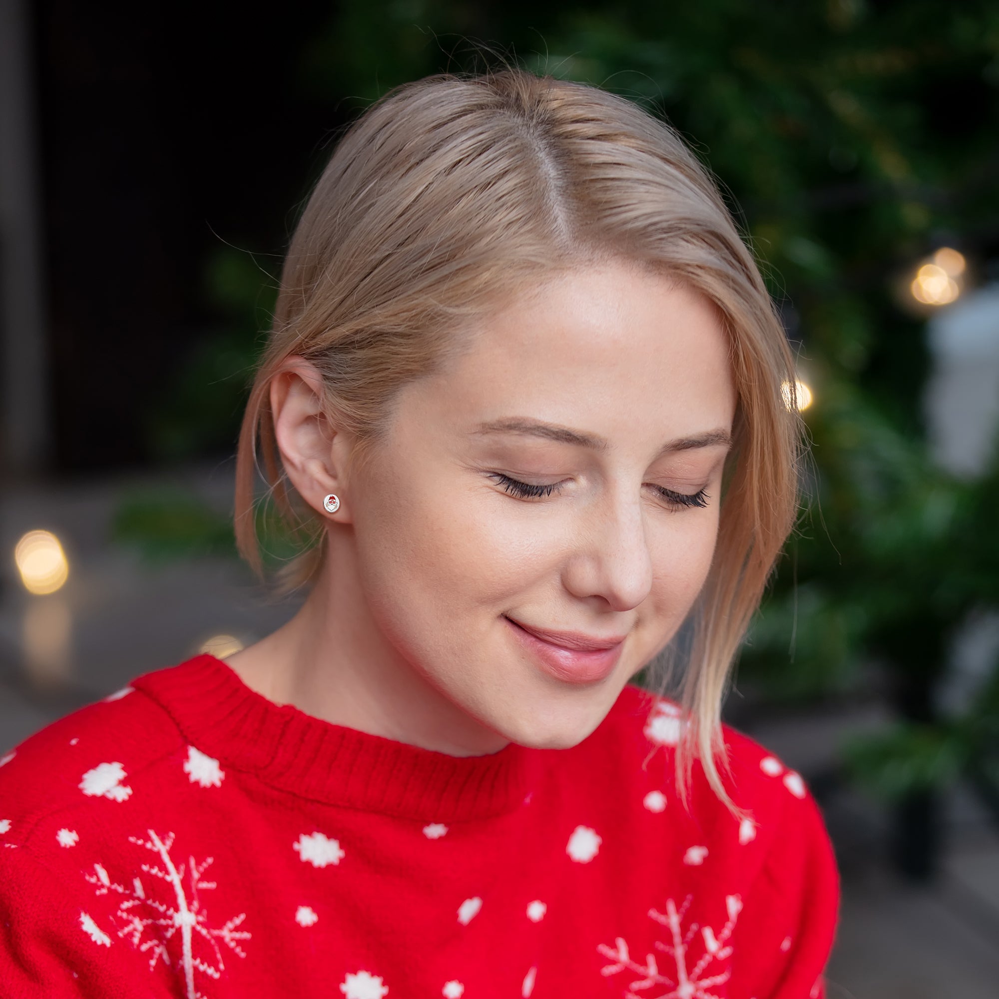 BodyCandy Christmas Peace Love Santa Stud Earrings by Onyx O — side view