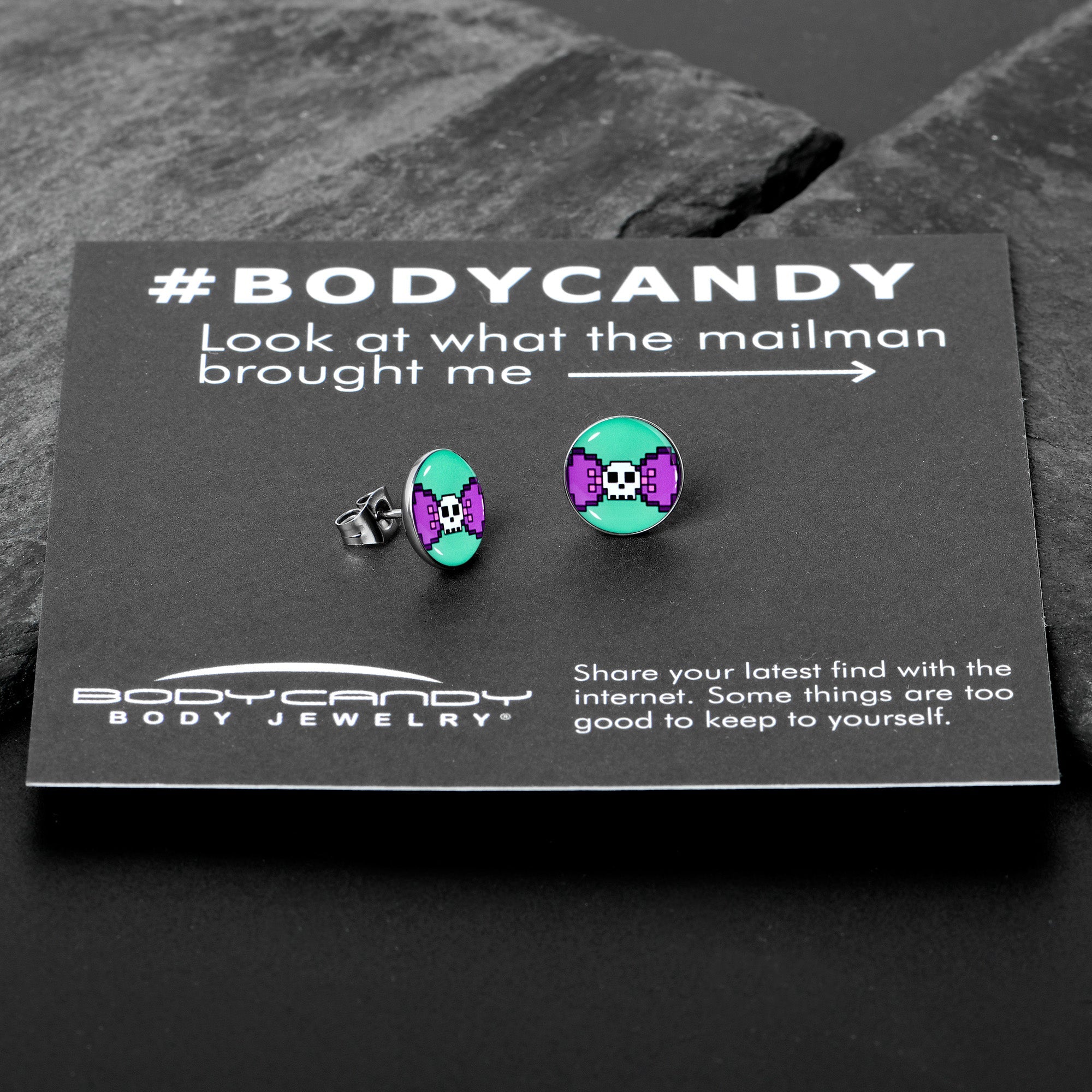 BodyCandy Retro Pixel Skull Stud Earrings by Onyx O — in-use photo
