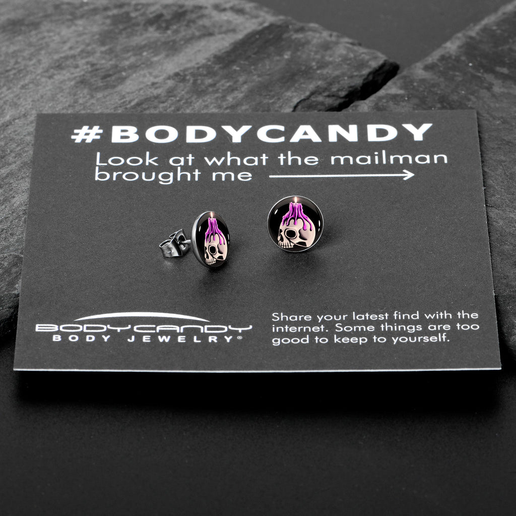 BodyCandy Burning Skull Candle Stud Earrings by Onyx O — in-use photo