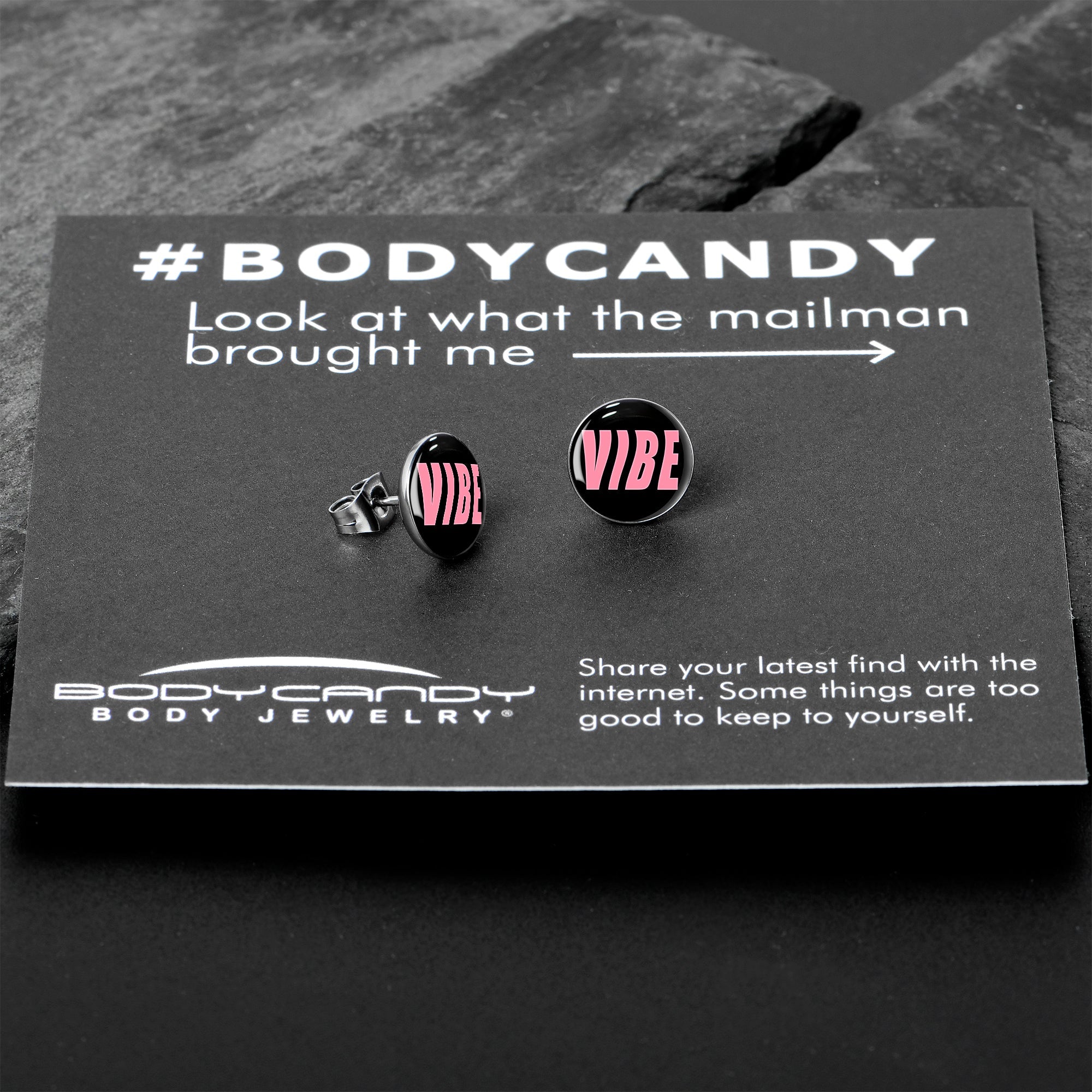 BodyCandy Vibe Stud Earrings by Onyx O — in-use photo