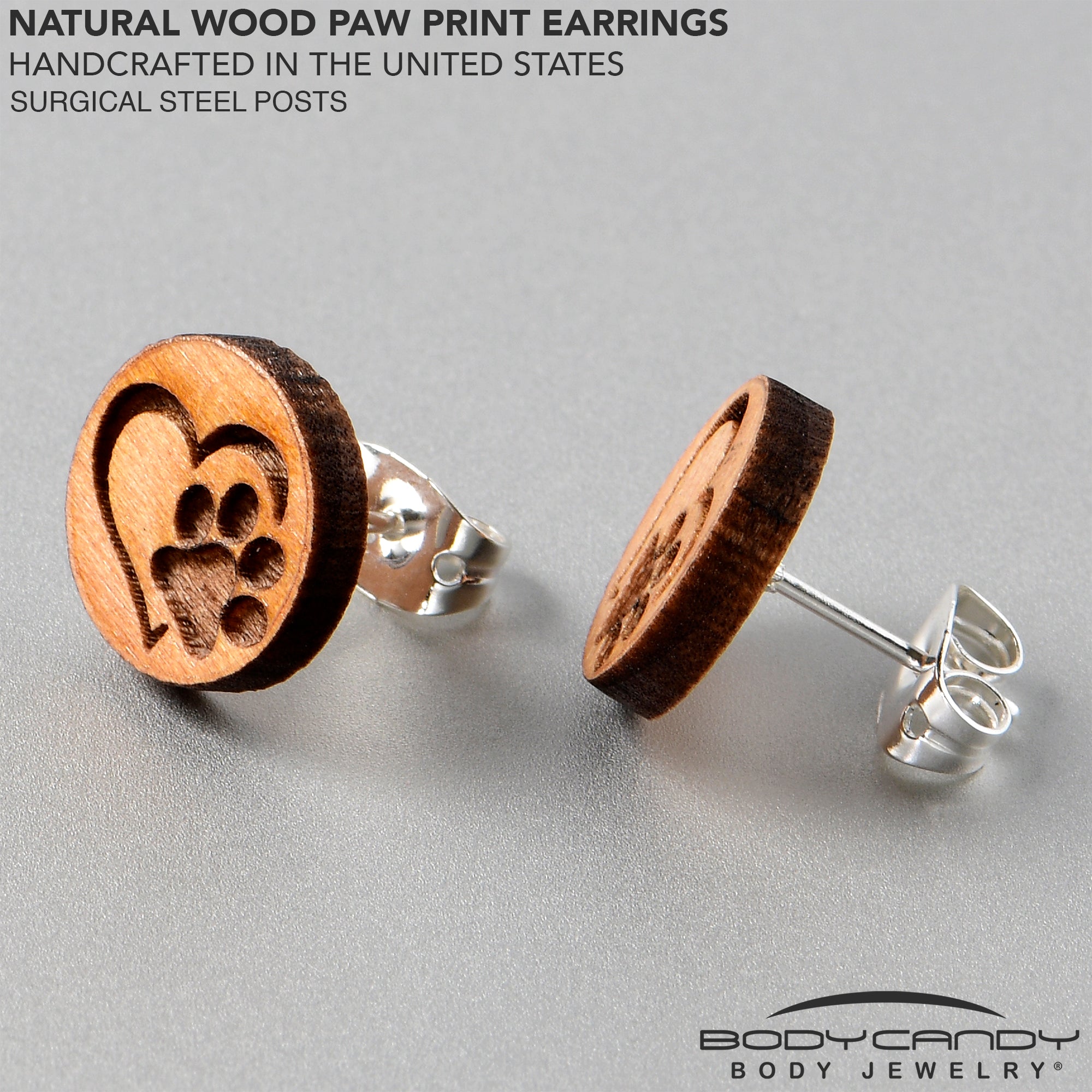 BodyCandy Natural Maple Wood Heart Paw Print Stud Earrings — lifestyle context