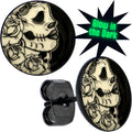 BodyCandy Black Anodized Gothic Rose Flower Skull Glow in the Dark Stud Earrings — main product shot