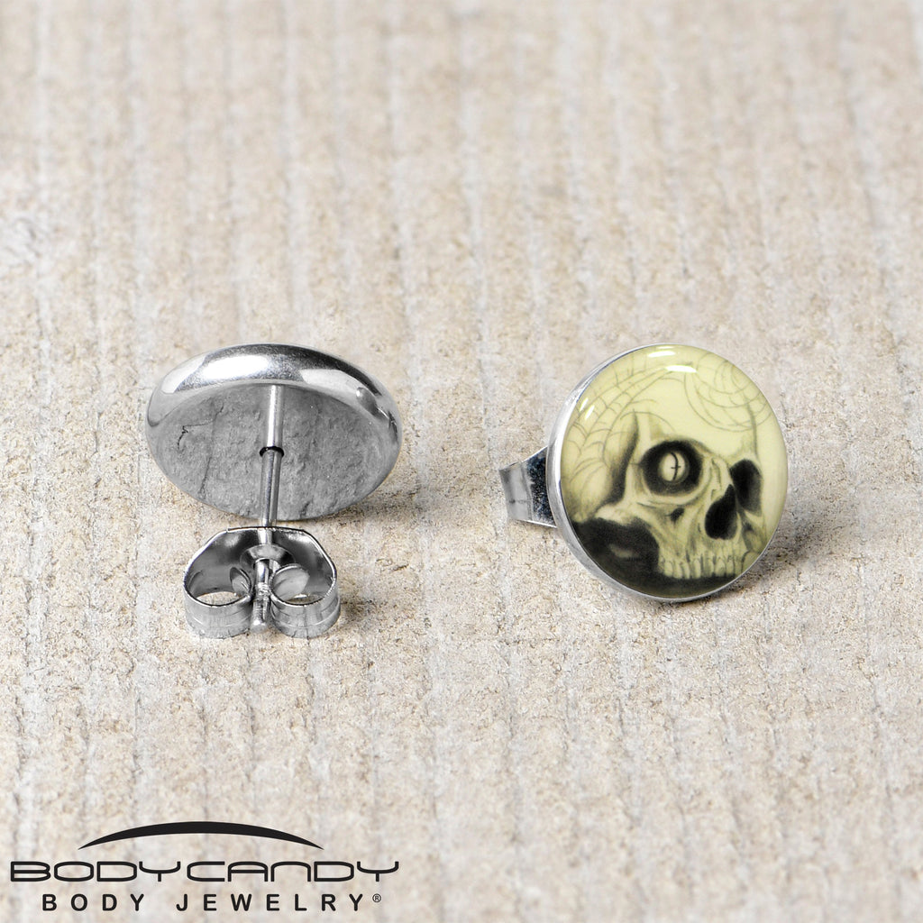 BodyCandy Webbed Skull Glow in the Dark Stud Earrings — lifestyle context