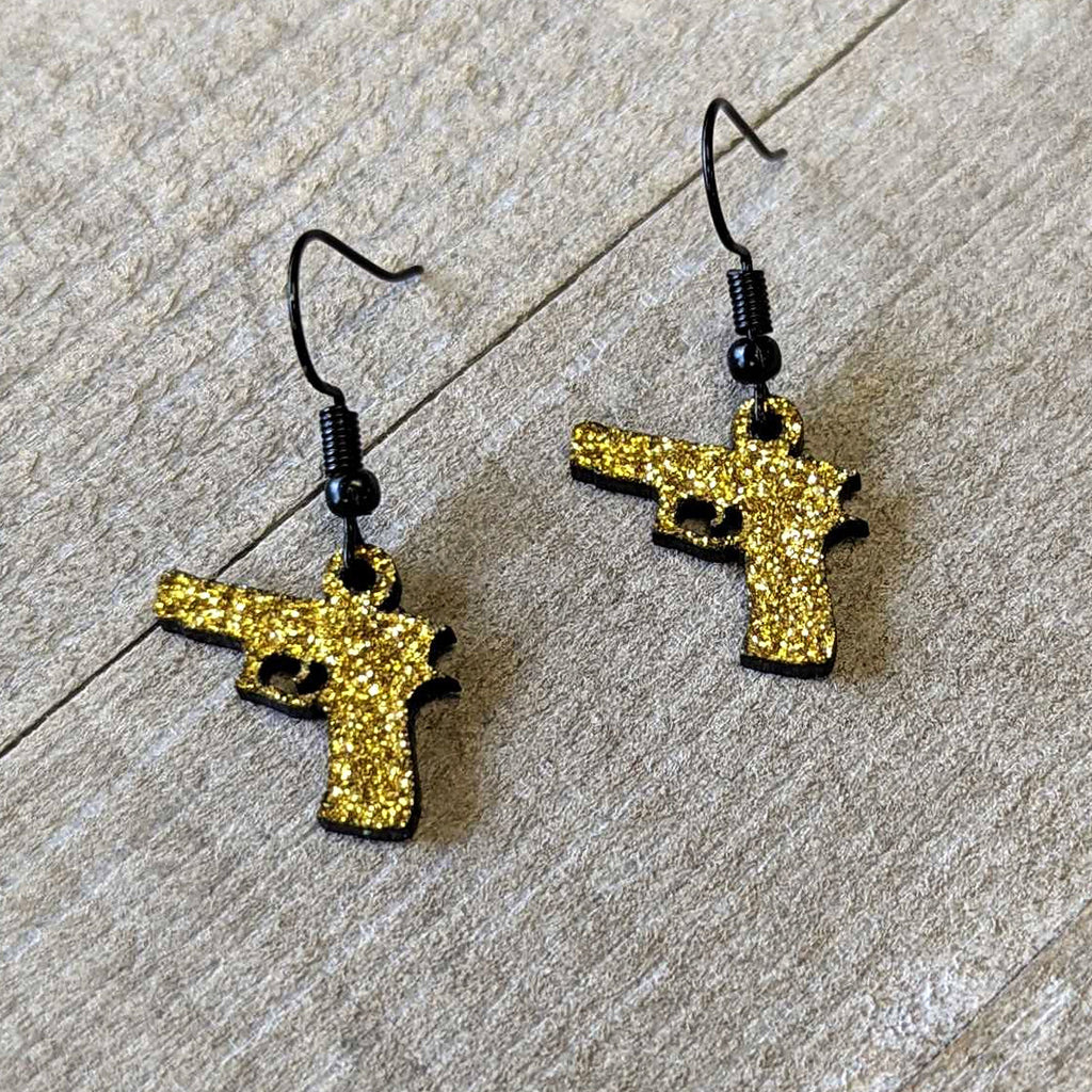 BodyCandy Yellow Glitter Gun Fishhook Dangle Earrings — lifestyle context
