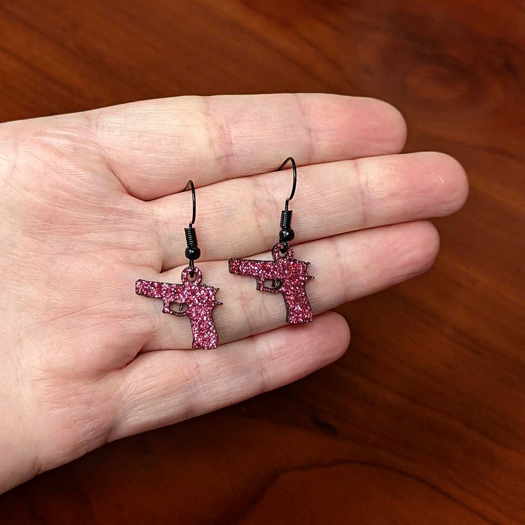 BodyCandy Pink Glitter Gun Fishhook Dangle Earrings — side view