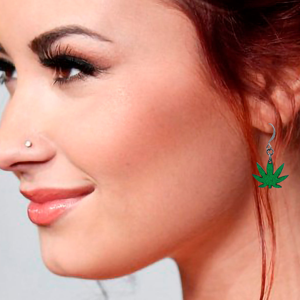 BodyCandy Green Marijuana Pot Leaf Dangle Earrings — in-use photo