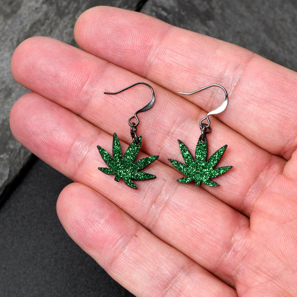 BodyCandy Green Glitter Marijuana Pot Leaf Dangle Earrings — detail close-up
