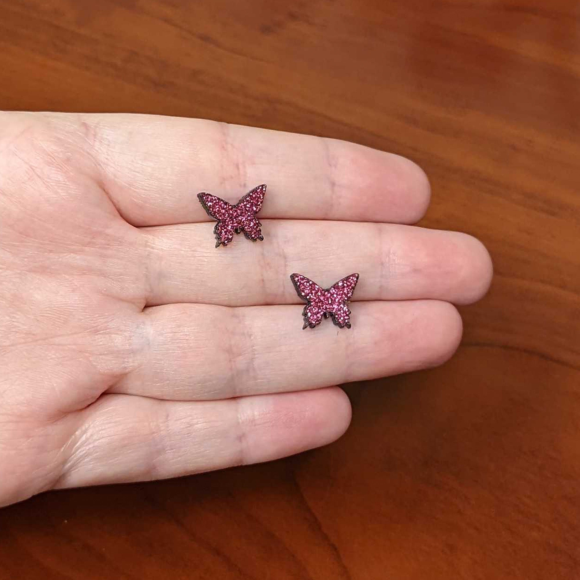 BodyCandy Pink Glitter Butterfly Stud Earring Set — side view