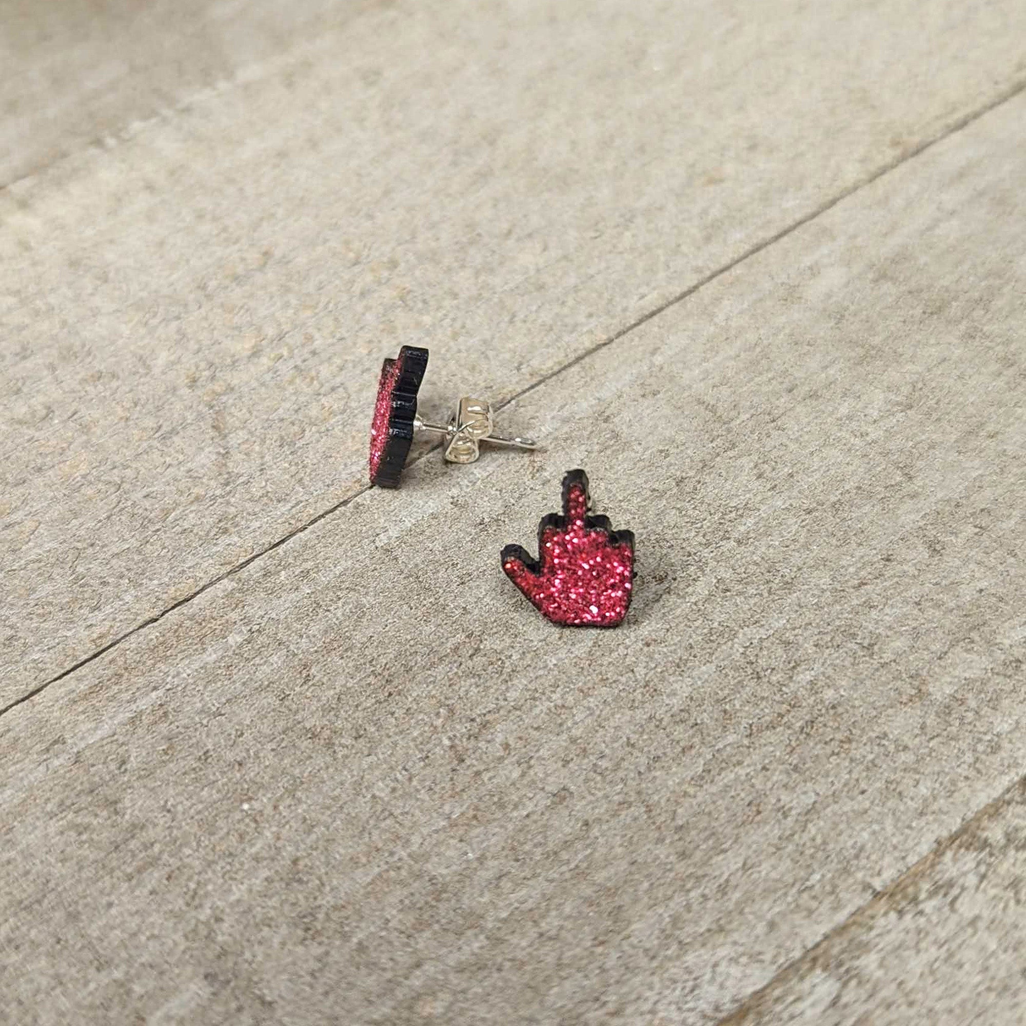 BodyCandy Pink Glitter Middle Finger Stud Earrings Set — lifestyle context