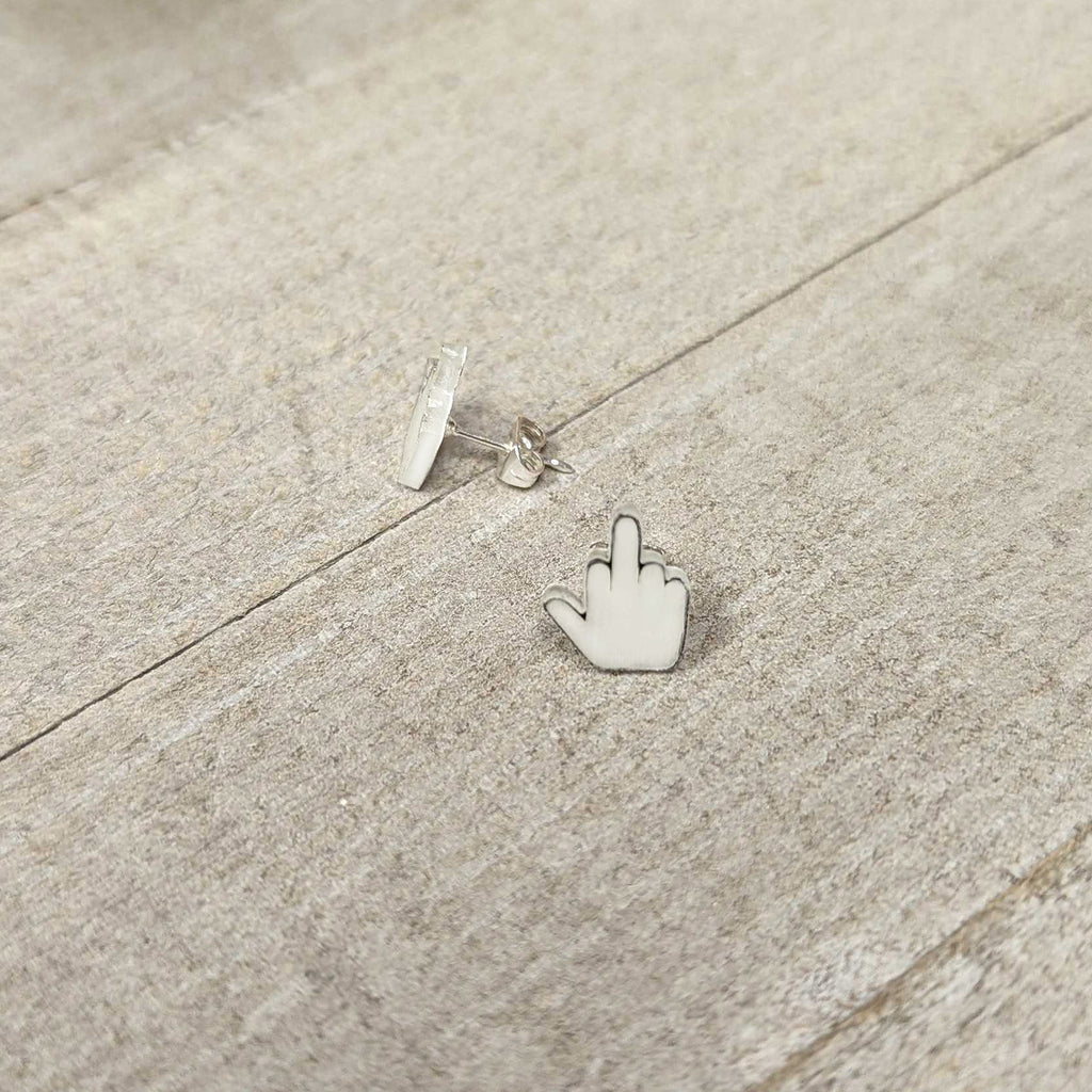 BodyCandy White Glow in the Dark Middle Finger Stud Earrings Set — side view