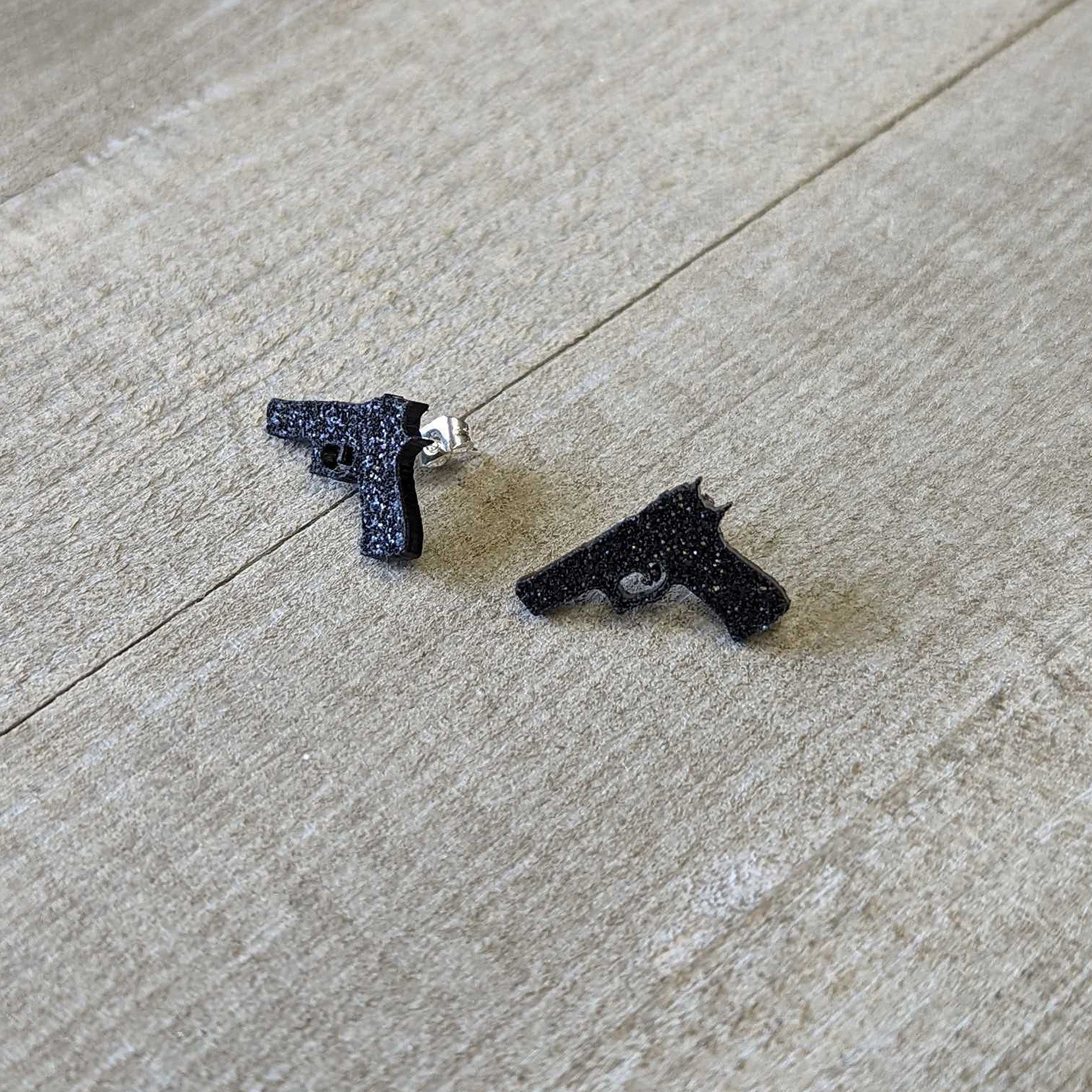 BodyCandy Black Glitter Gun Stud Earrings Set — lifestyle context